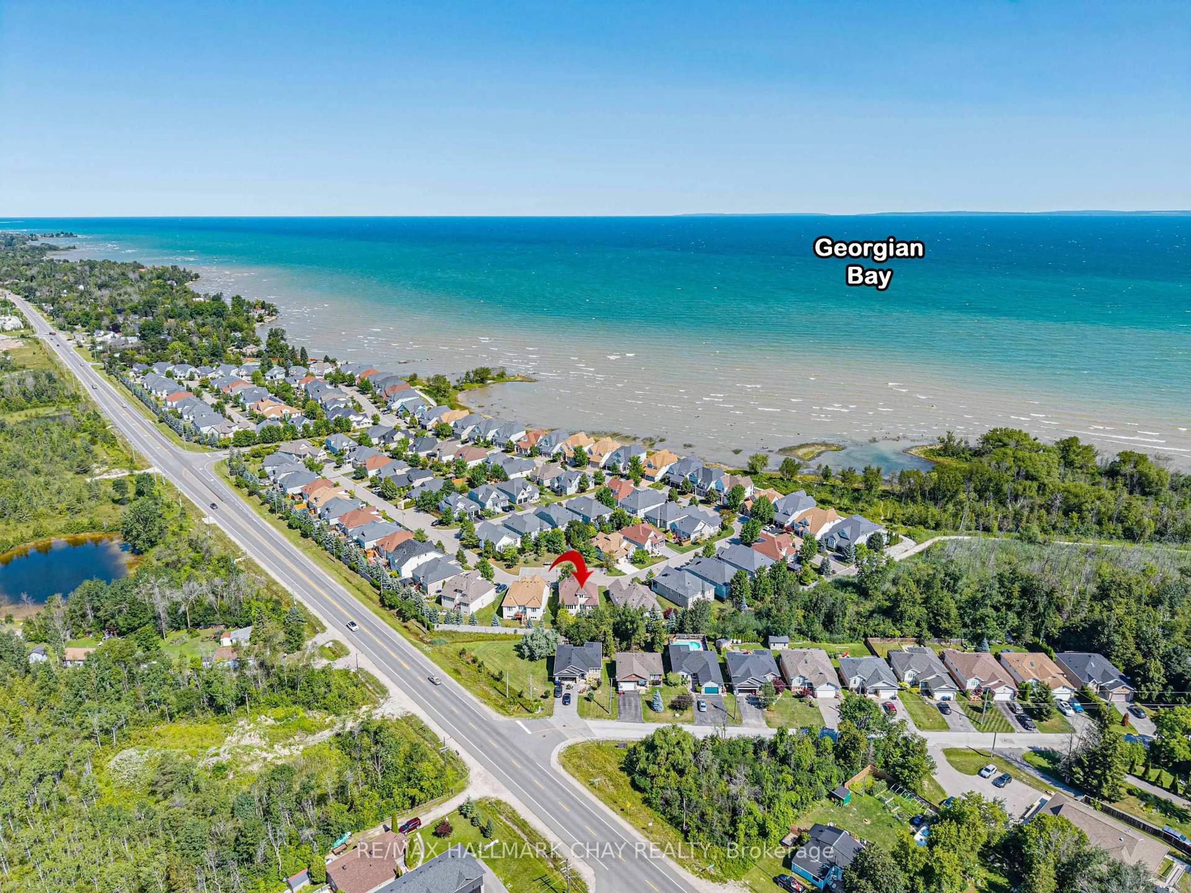 A pic from outside/outdoor area/front of a property/back of a property/a pic from drone, water/lake/river/ocean view for 36 Starboard Circ, Wasaga Beach Ontario L9Z 0E9