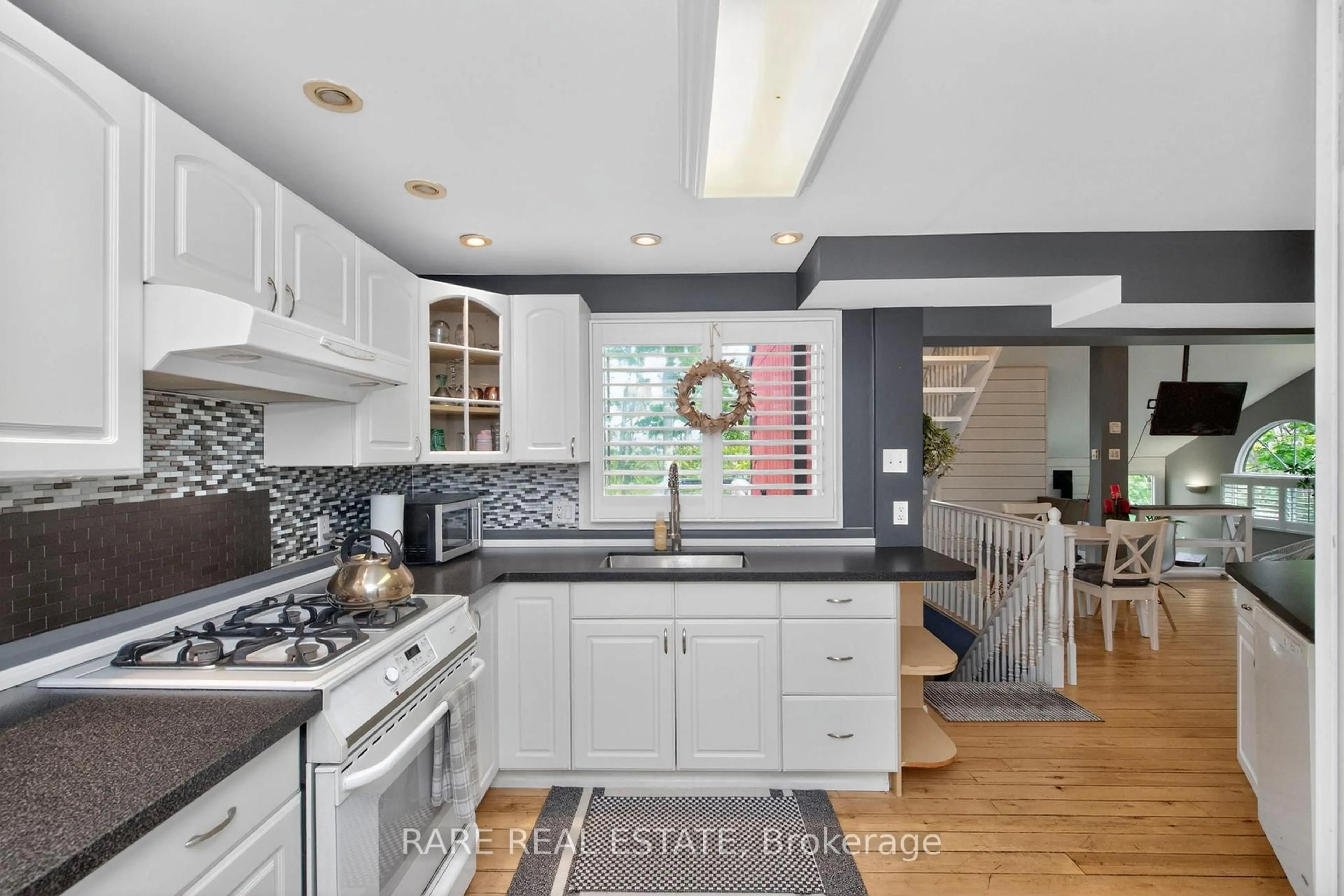Open concept kitchen, ceramic/tile floor for 82 Huronwoods Dr, Oro-Medonte Ontario L0K 1E0
