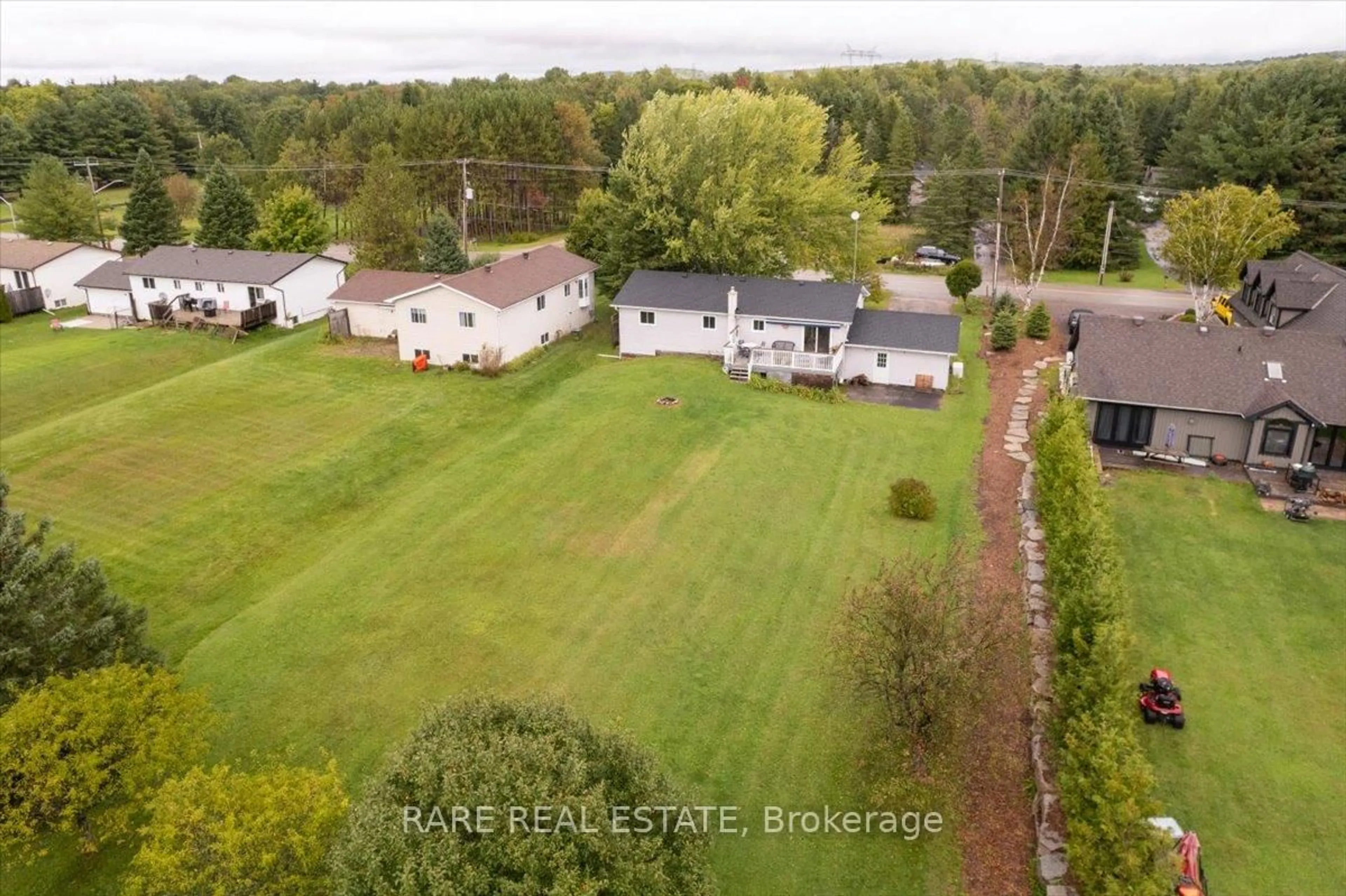 A pic from outside/outdoor area/front of a property/back of a property/a pic from drone, water/lake/river/ocean view for 66 Scarlett Line, Springwater Ontario L0L 1V0