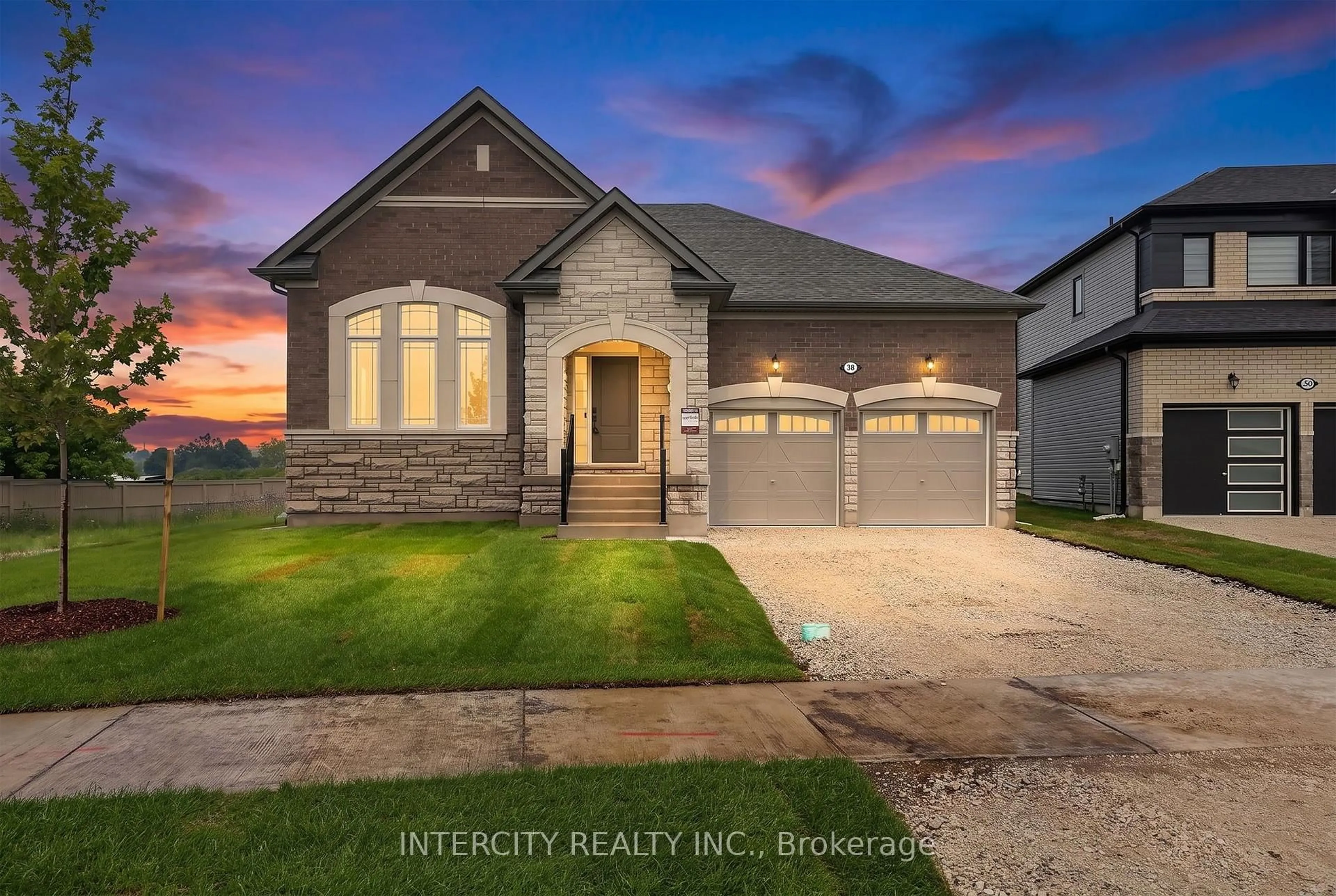 Home with brick exterior material, street for 38 Legacy Circ, Wasaga Beach Ontario L9Z 0M5