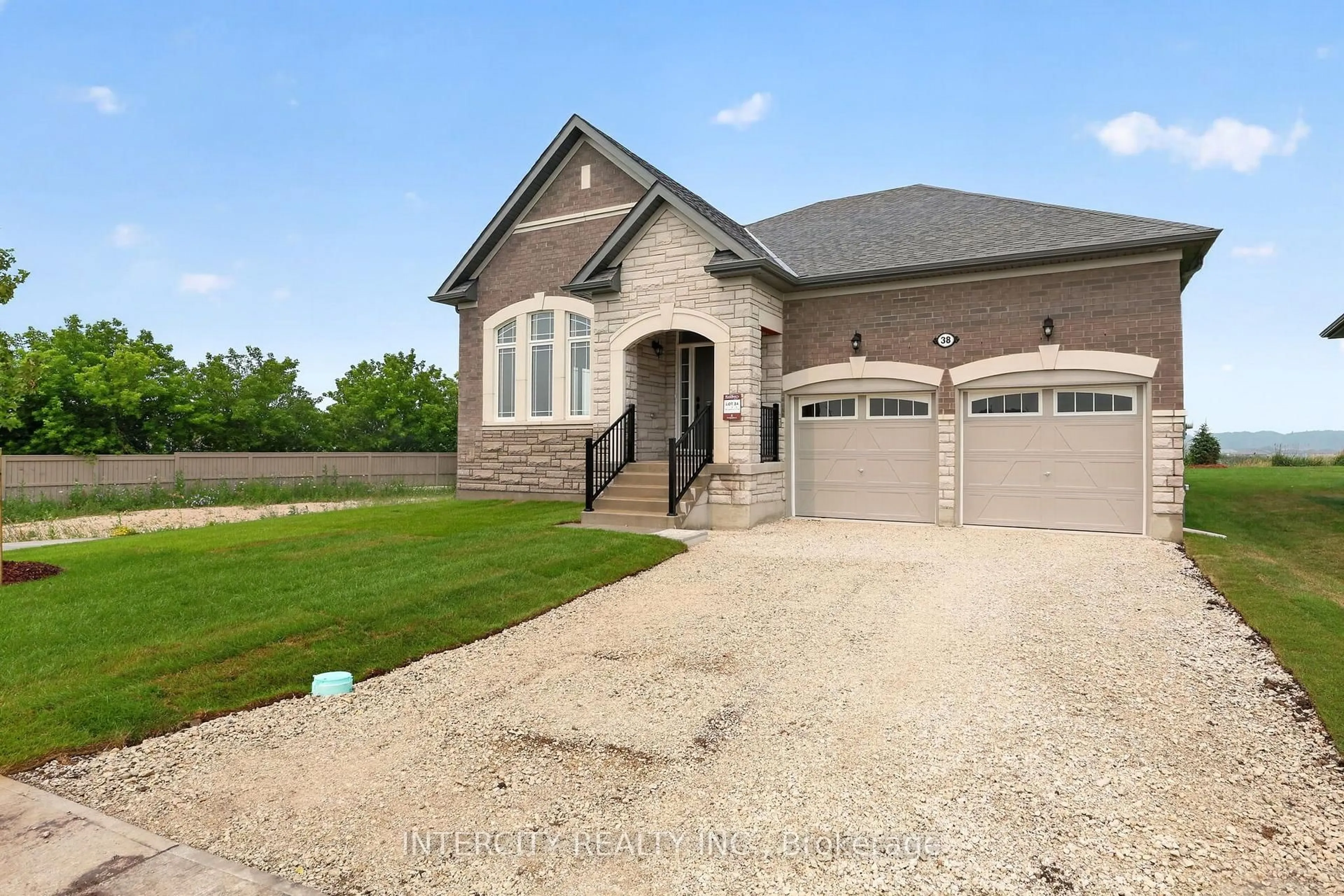 Home with brick exterior material, street for 38 Legacy Circ, Wasaga Beach Ontario L9Z 0M5