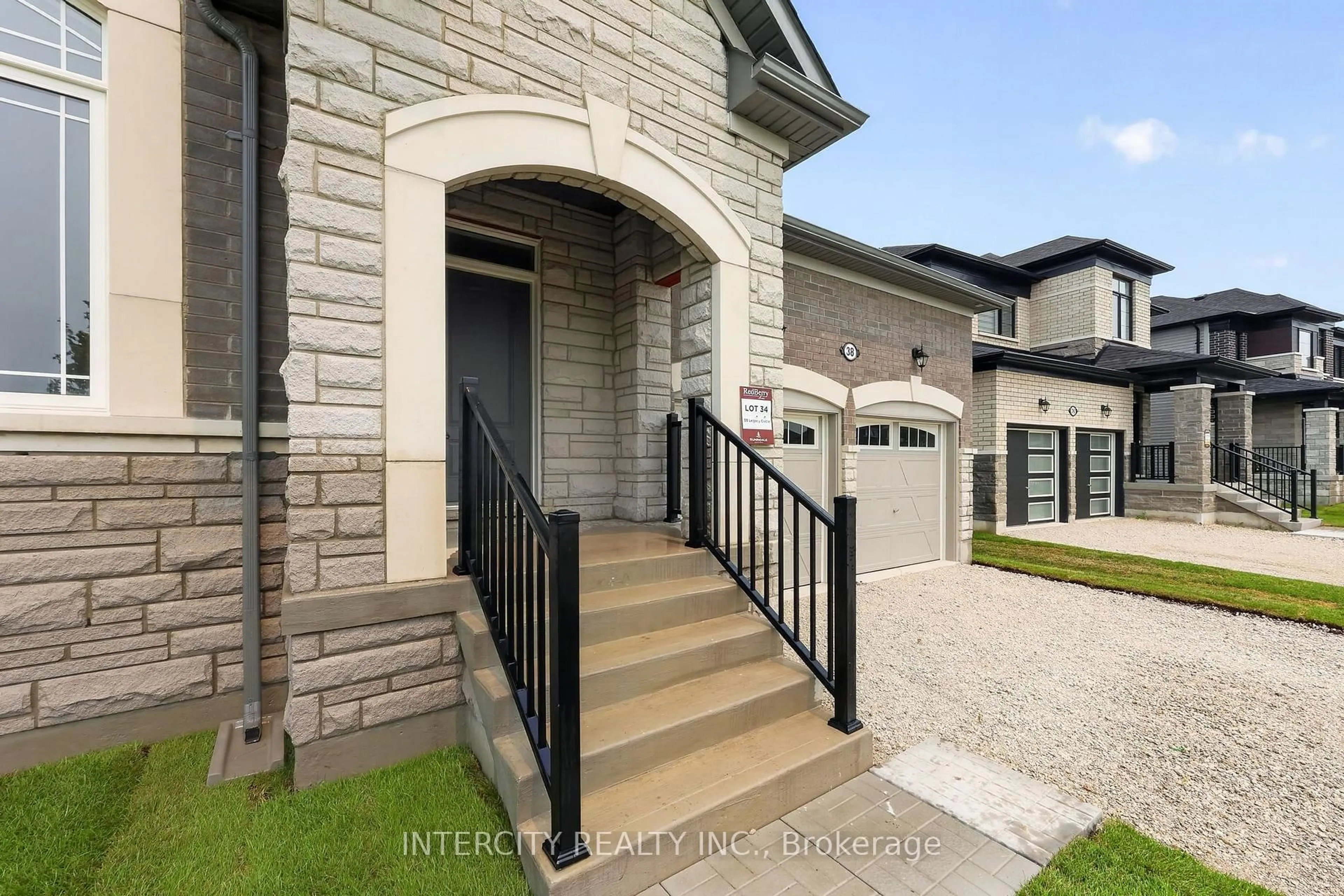 Home with brick exterior material, street for 38 Legacy Circ, Wasaga Beach Ontario L9Z 0M5