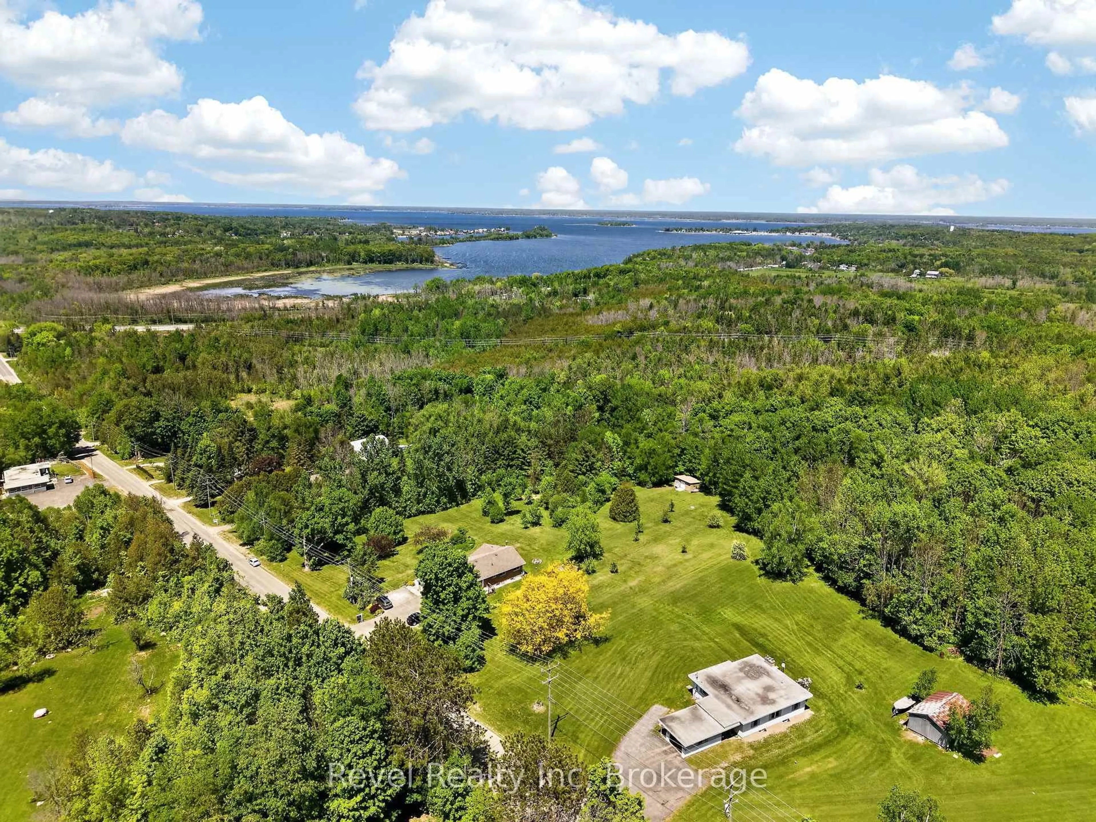 A pic from outside/outdoor area/front of a property/back of a property/a pic from drone, water/lake/river/ocean view for 2391 Rumney Rd, Tay Ontario L4R 4K3