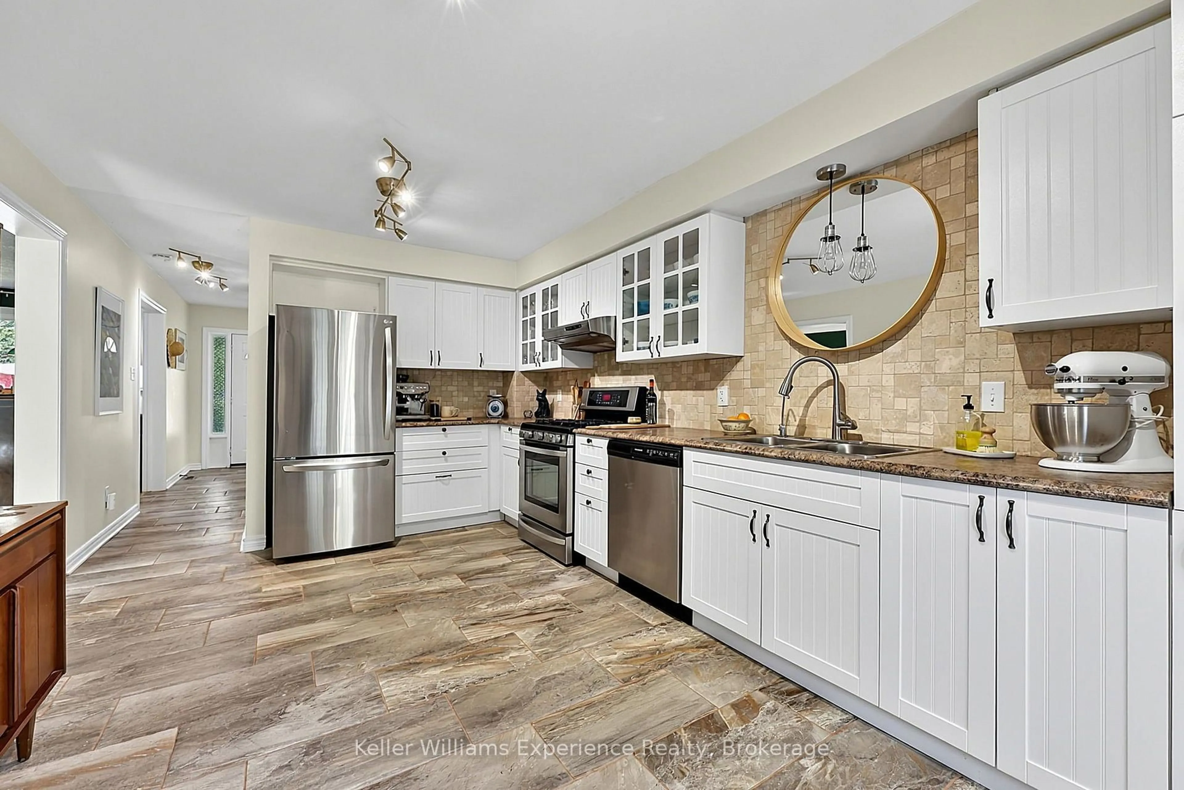 Open concept kitchen, ceramic/tile floor for 1044 Dina Cres, Midland Ontario L4R 5C5