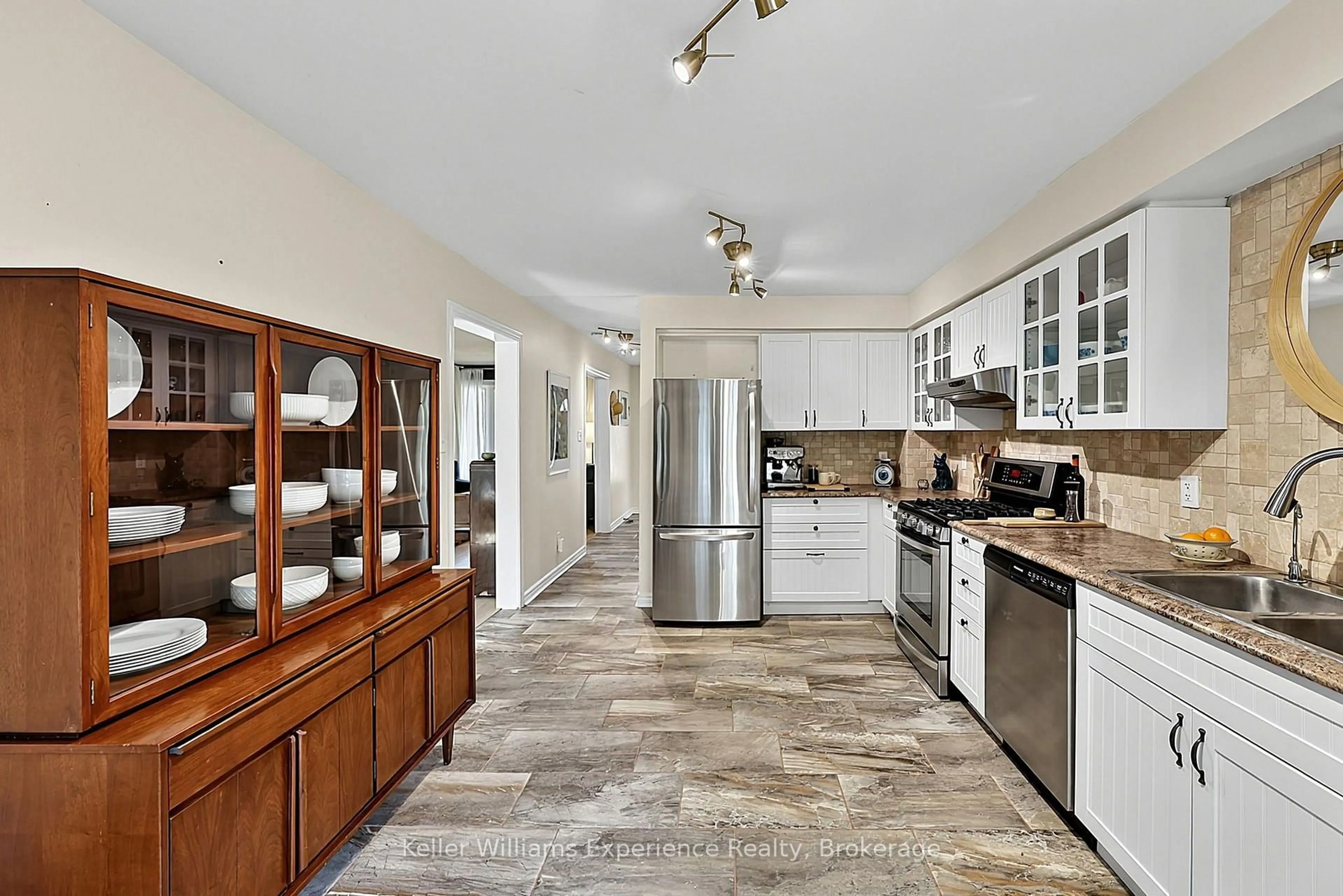 Open concept kitchen, ceramic/tile floor for 1044 Dina Cres, Midland Ontario L4R 5C5