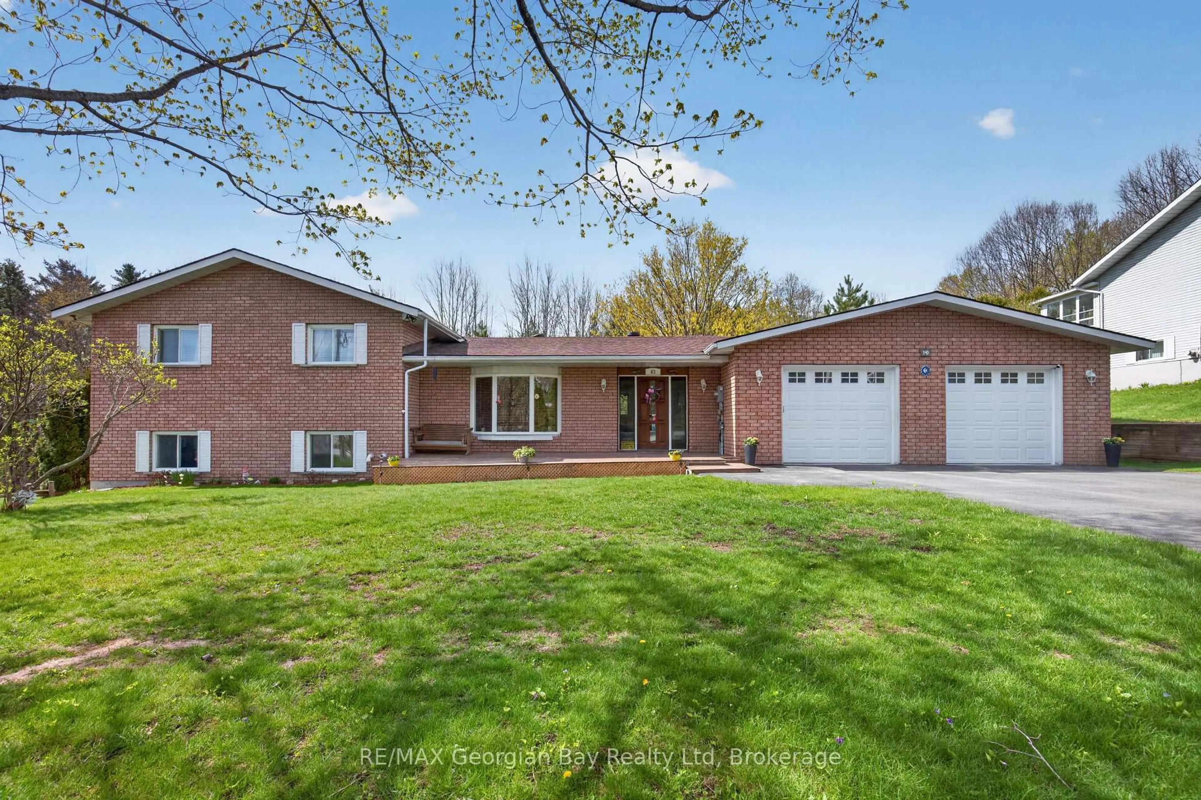 Home with brick exterior material, street for 63 Lepage Dr, Penetanguishene Ontario L9M 1R5