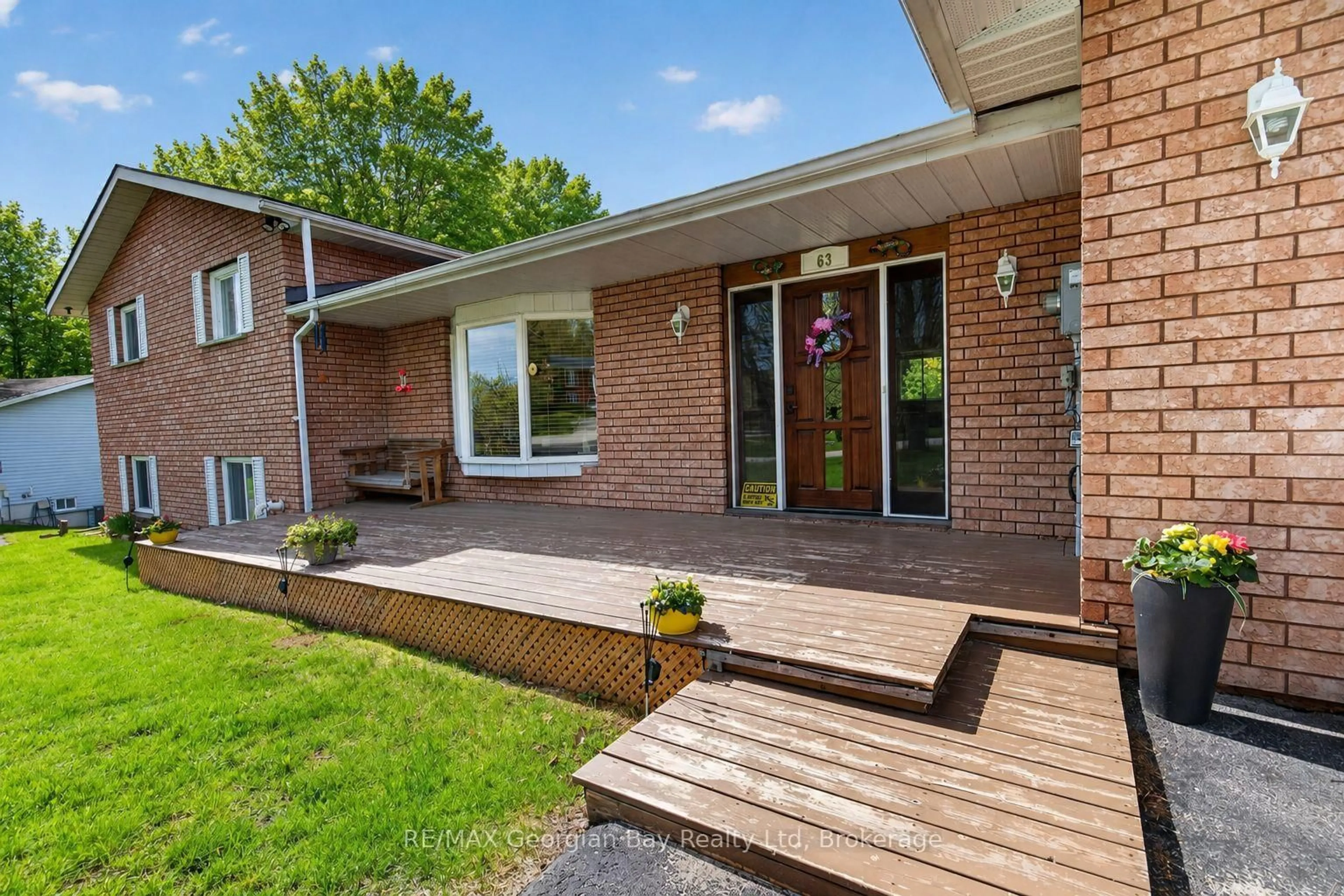 Home with brick exterior material, street for 63 Lepage Dr, Penetanguishene Ontario L9M 1R5
