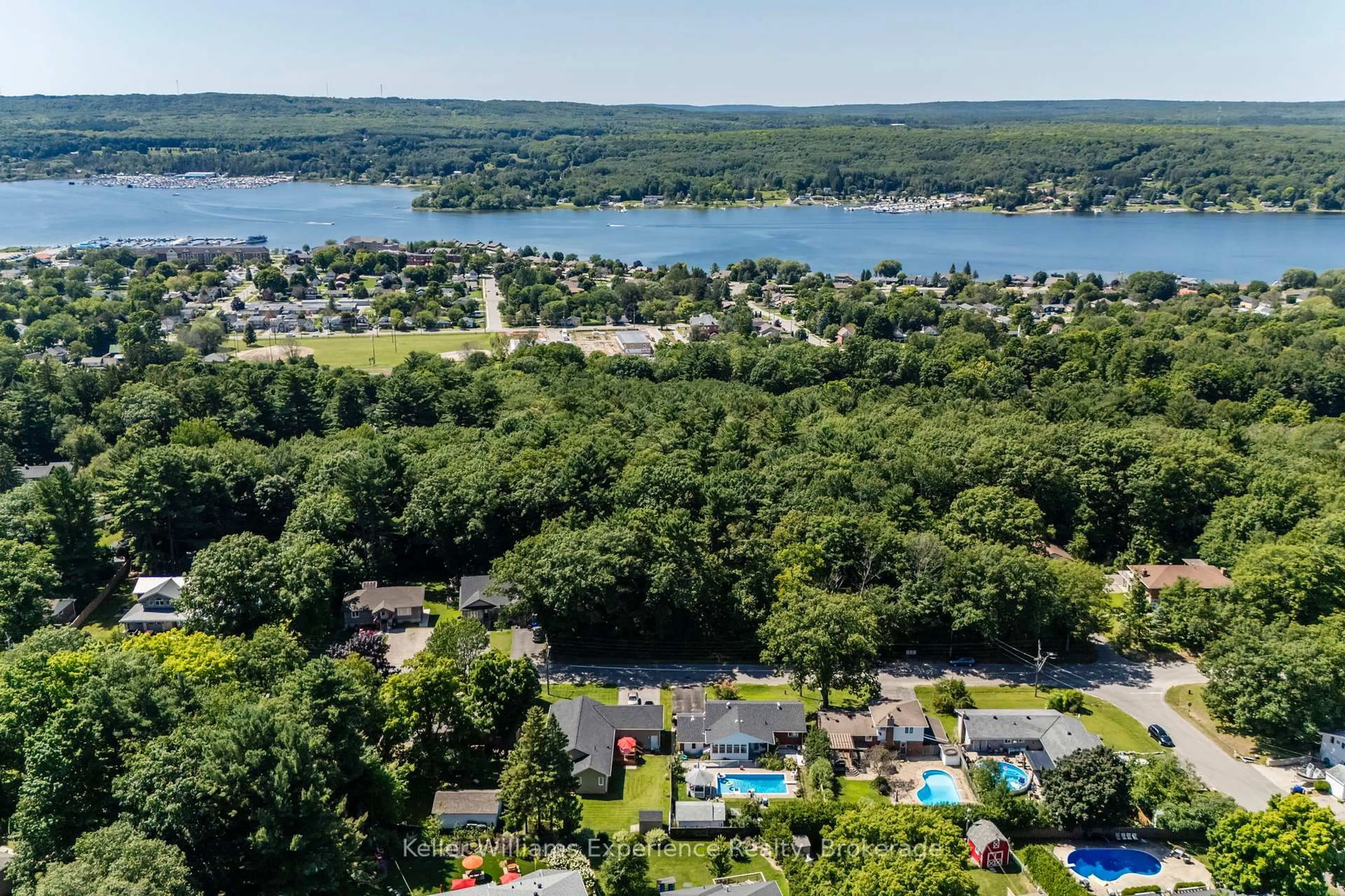 A pic from outside/outdoor area/front of a property/back of a property/a pic from drone, water/lake/river/ocean view for 63 Lorne Ave, Penetanguishene Ontario L9M 1H8