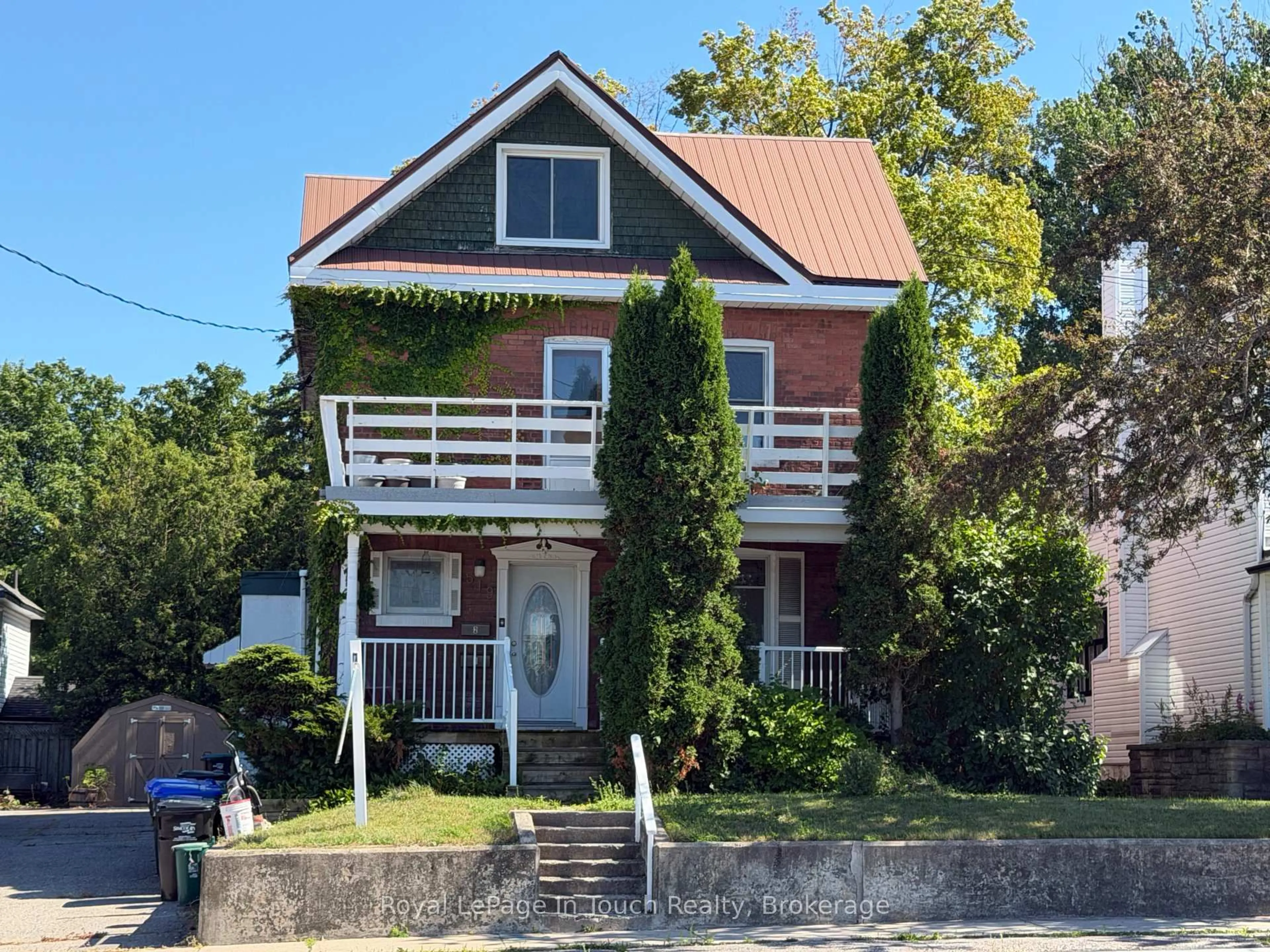 Home with brick exterior material, street for 519 Yonge St, Midland Ontario L4R 2C6