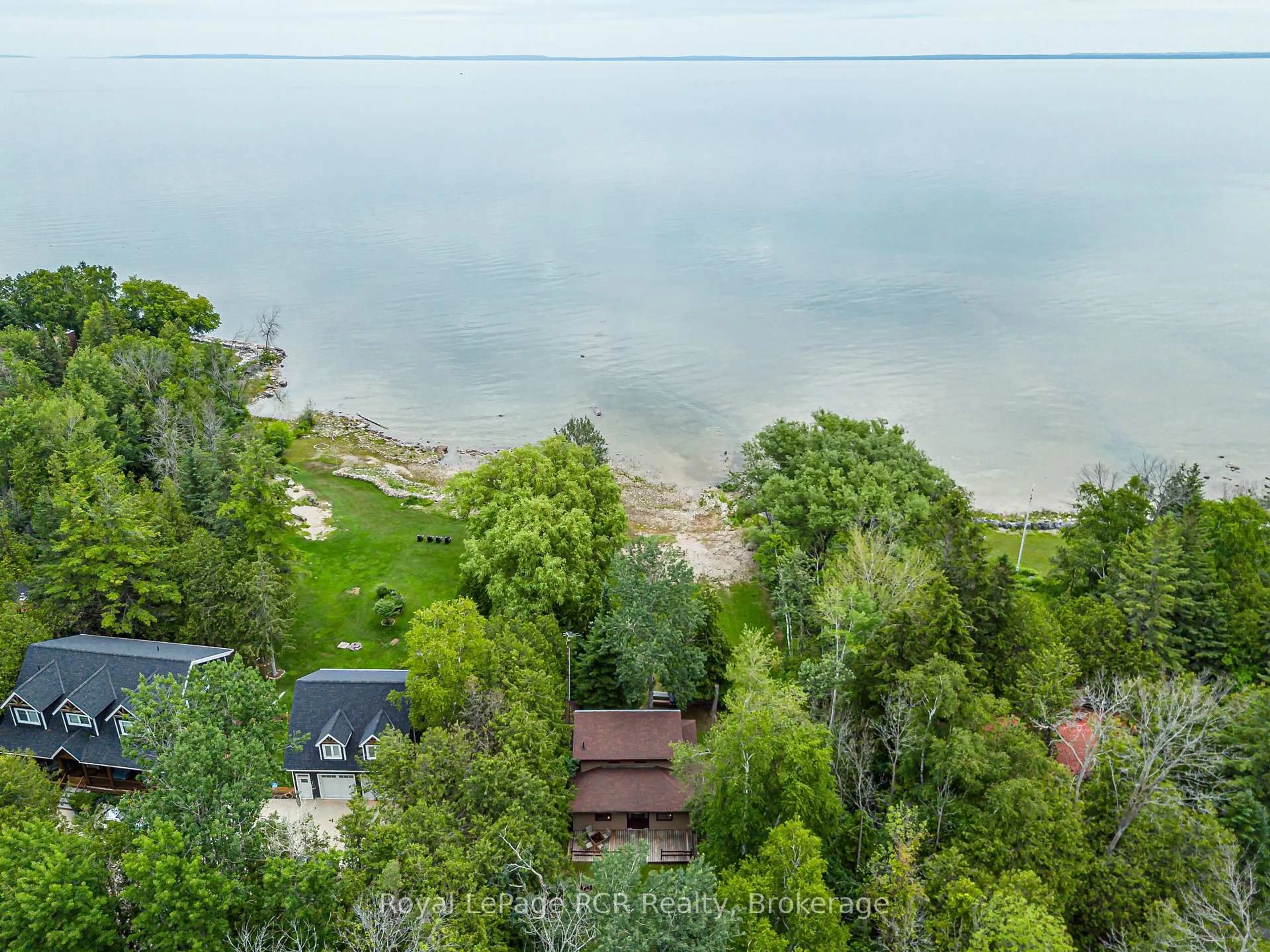 A pic from outside/outdoor area/front of a property/back of a property/a pic from drone, water/lake/river/ocean view for 35 Georgian Manor Dr, Collingwood Ontario L9Y 5P2