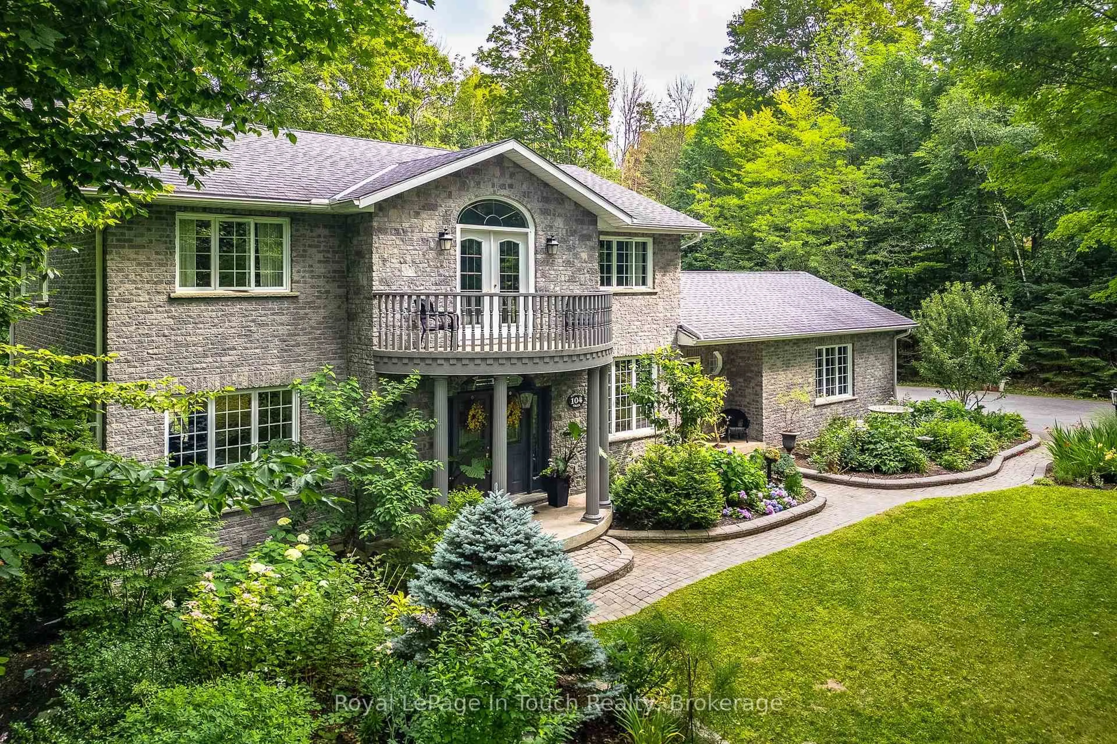 Home with brick exterior material, street for 104 Copeland Creek Dr, Tiny Ontario L9M 0M2