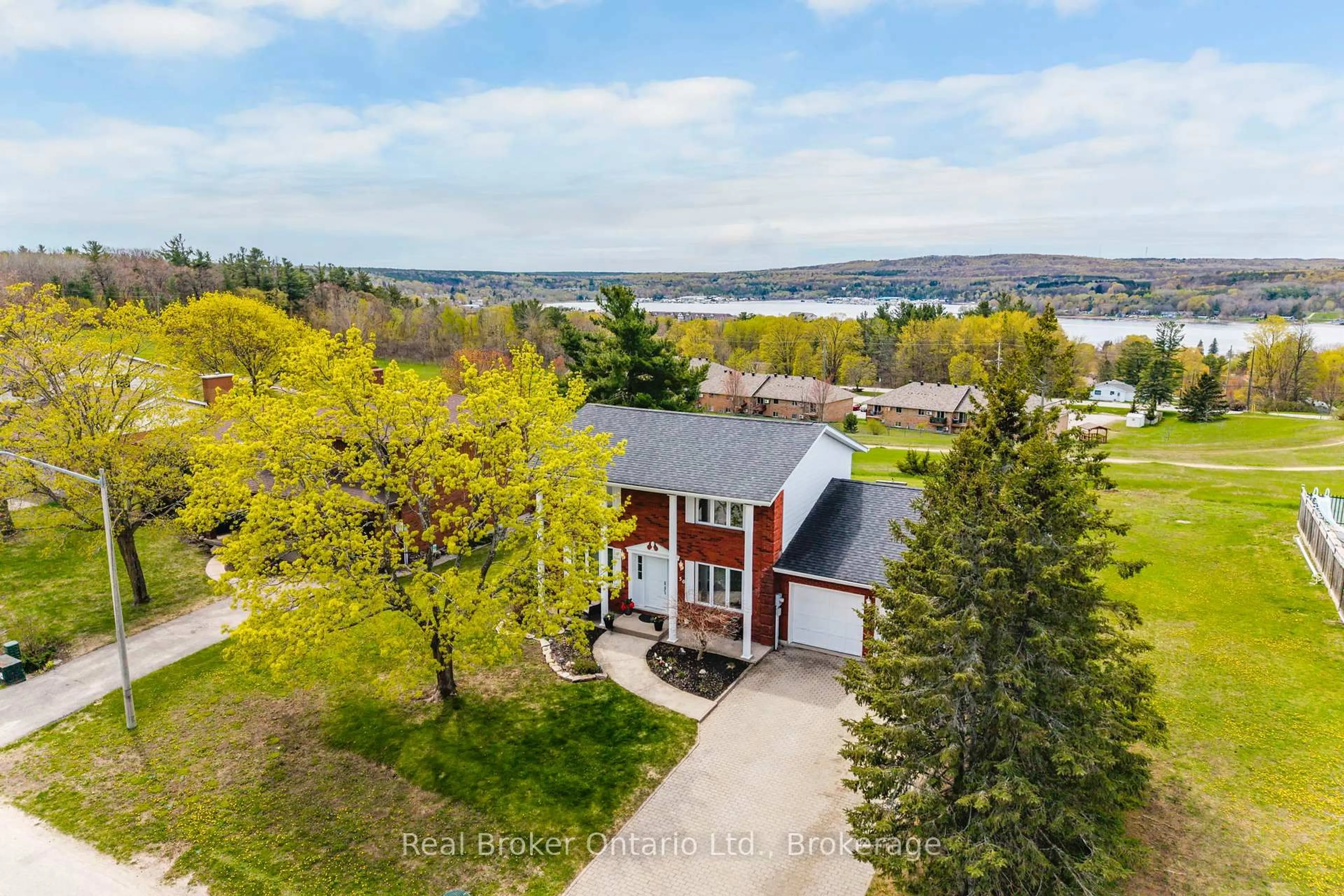 A pic from outside/outdoor area/front of a property/back of a property/a pic from drone, water/lake/river/ocean view for 50 Payette Dr, Penetanguishene Ontario L9M 1H5