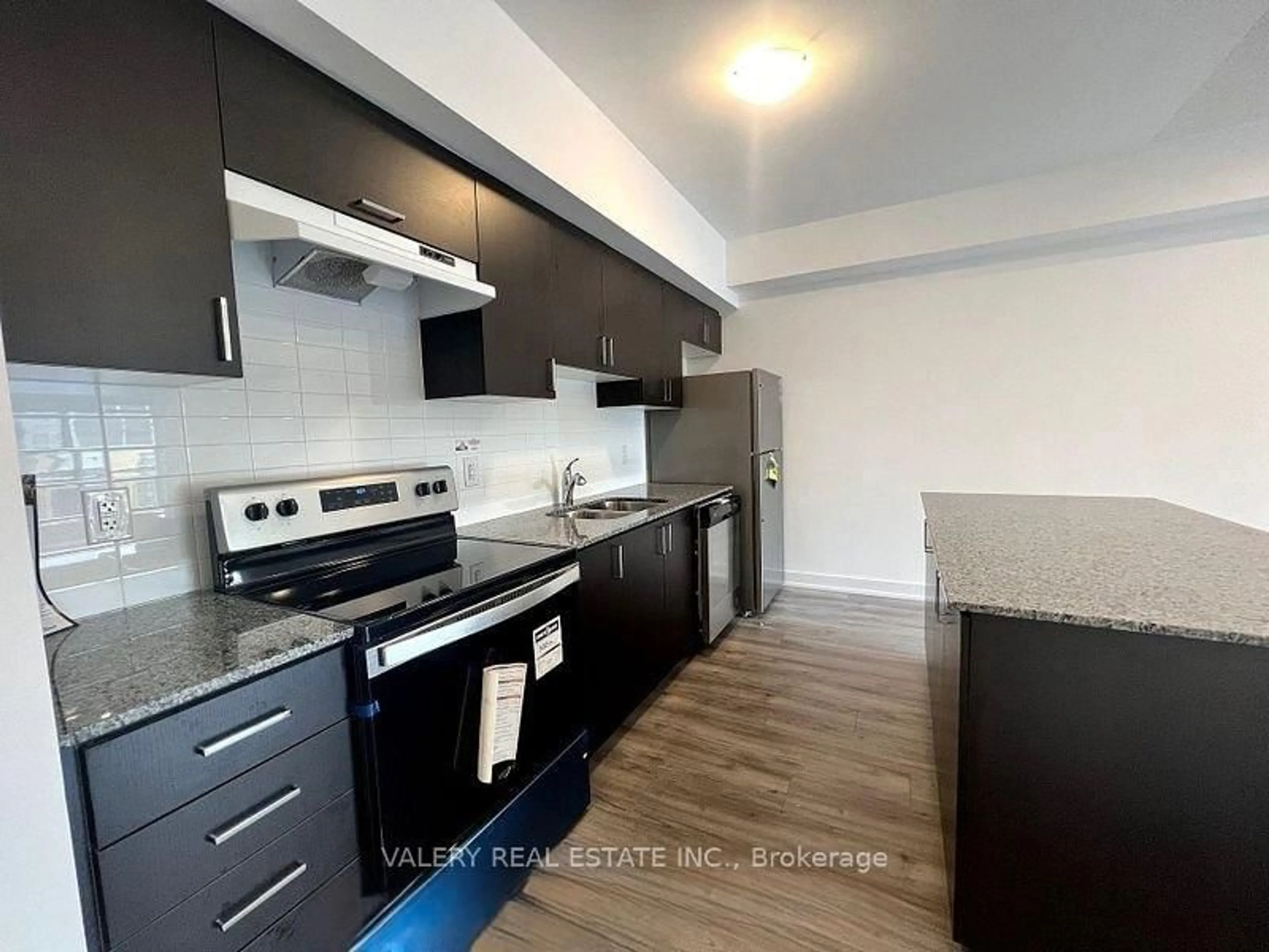 Standard kitchen, wood/laminate floor for 1 Chef Lane #205, Barrie Ontario L9J 0J8