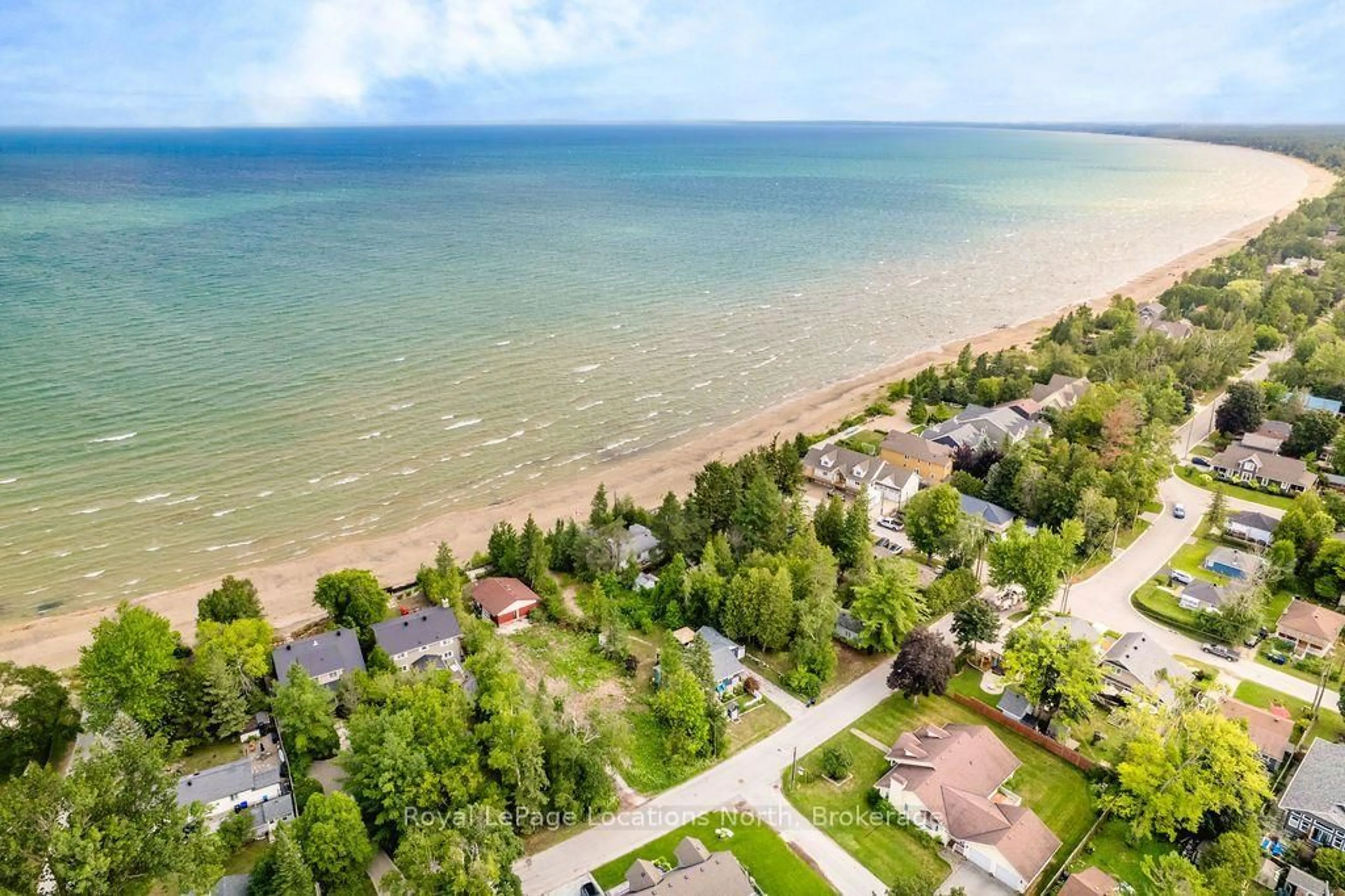 A pic from outside/outdoor area/front of a property/back of a property/a pic from drone, water/lake/river/ocean view for 1864 Shore Lane, Wasaga Beach Ontario L9Z 1V2