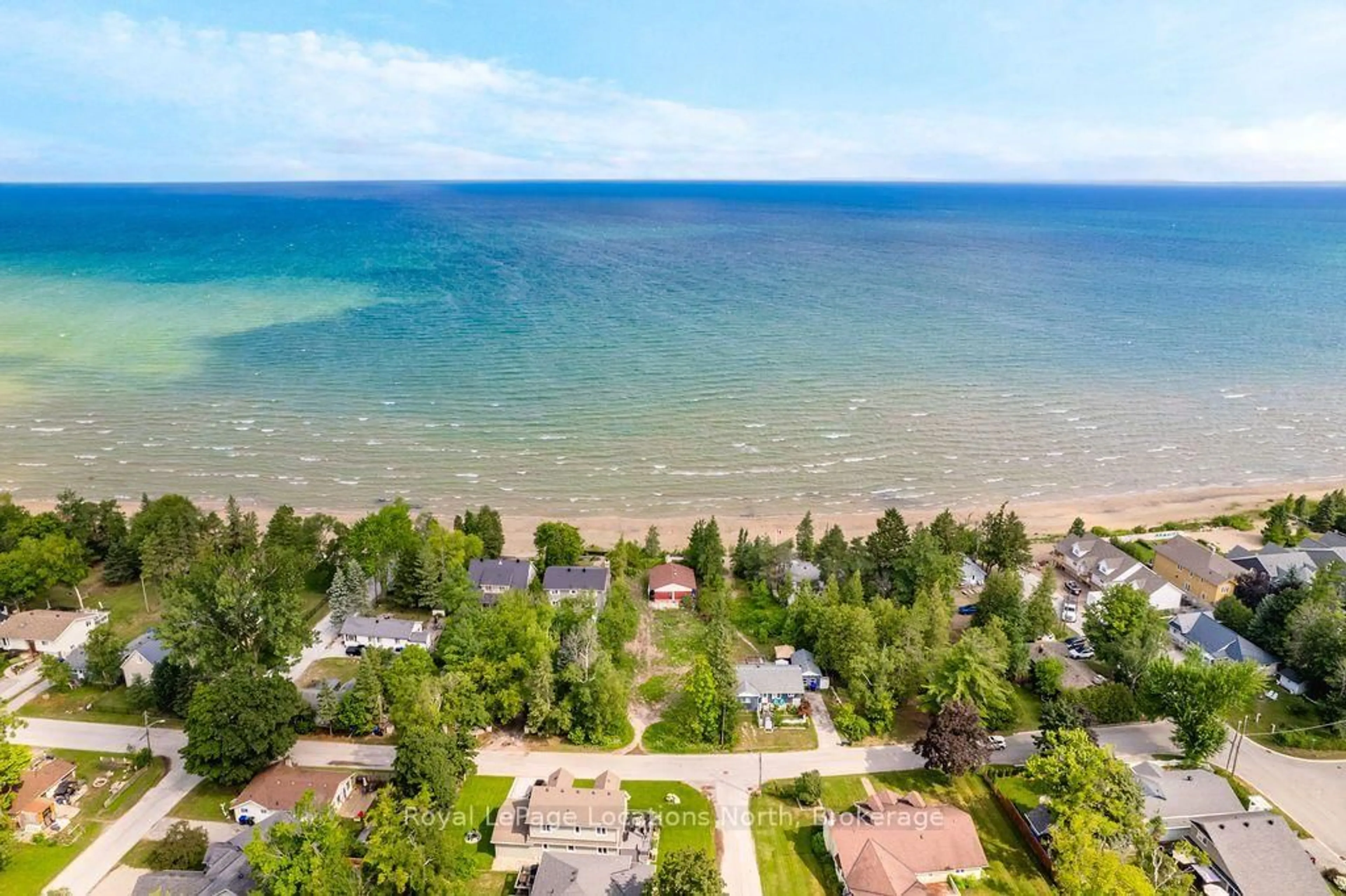 A pic from outside/outdoor area/front of a property/back of a property/a pic from drone, water/lake/river/ocean view for 1864 Shore Lane, Wasaga Beach Ontario L9Z 1V2