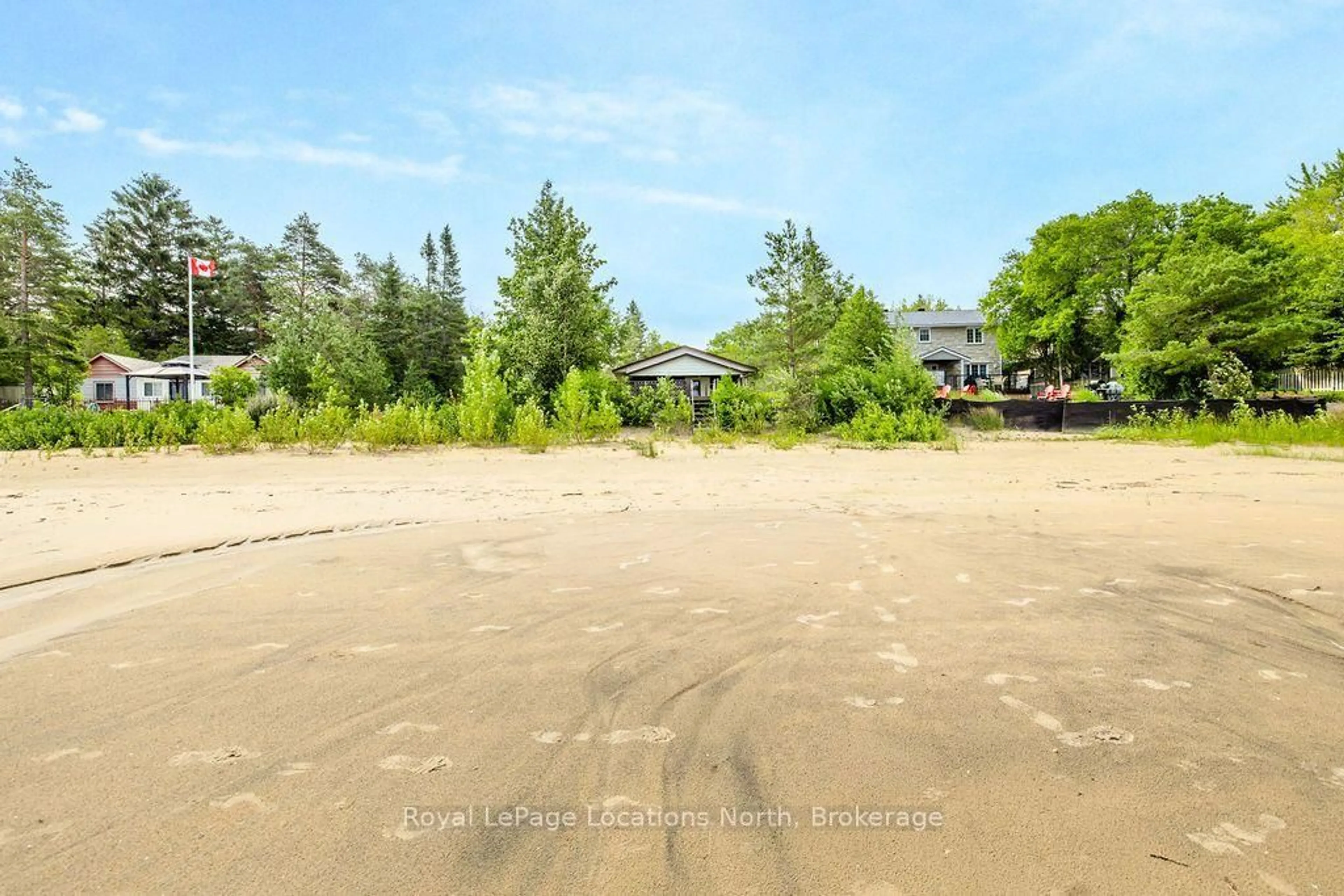 A pic from outside/outdoor area/front of a property/back of a property/a pic from drone, water/lake/river/ocean view for 1864 Shore Lane, Wasaga Beach Ontario L9Z 1V2