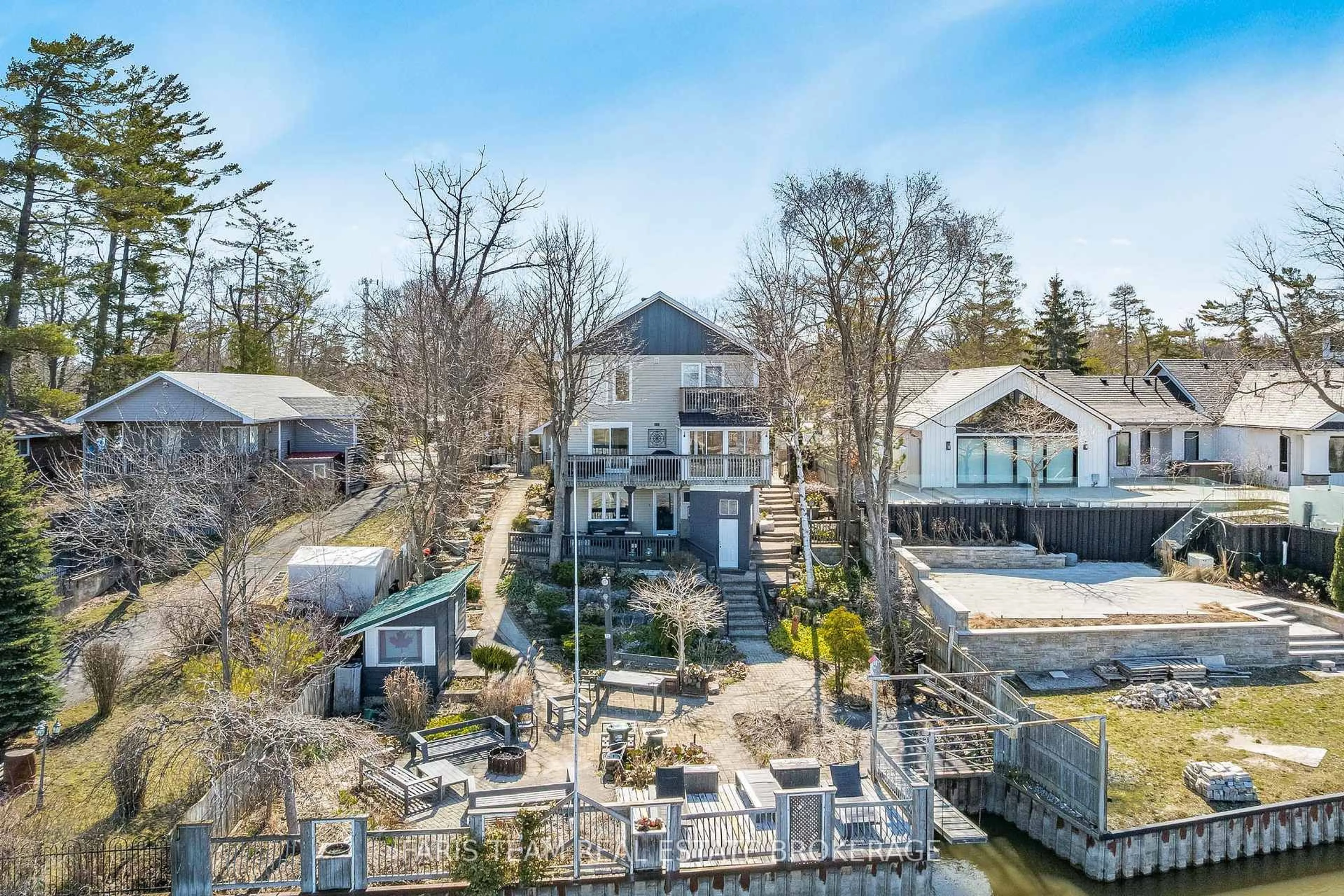 A pic from outside/outdoor area/front of a property/back of a property/a pic from drone, water/lake/river/ocean view for 60 River Avenue Cres, Wasaga Beach Ontario L9Z 2K6