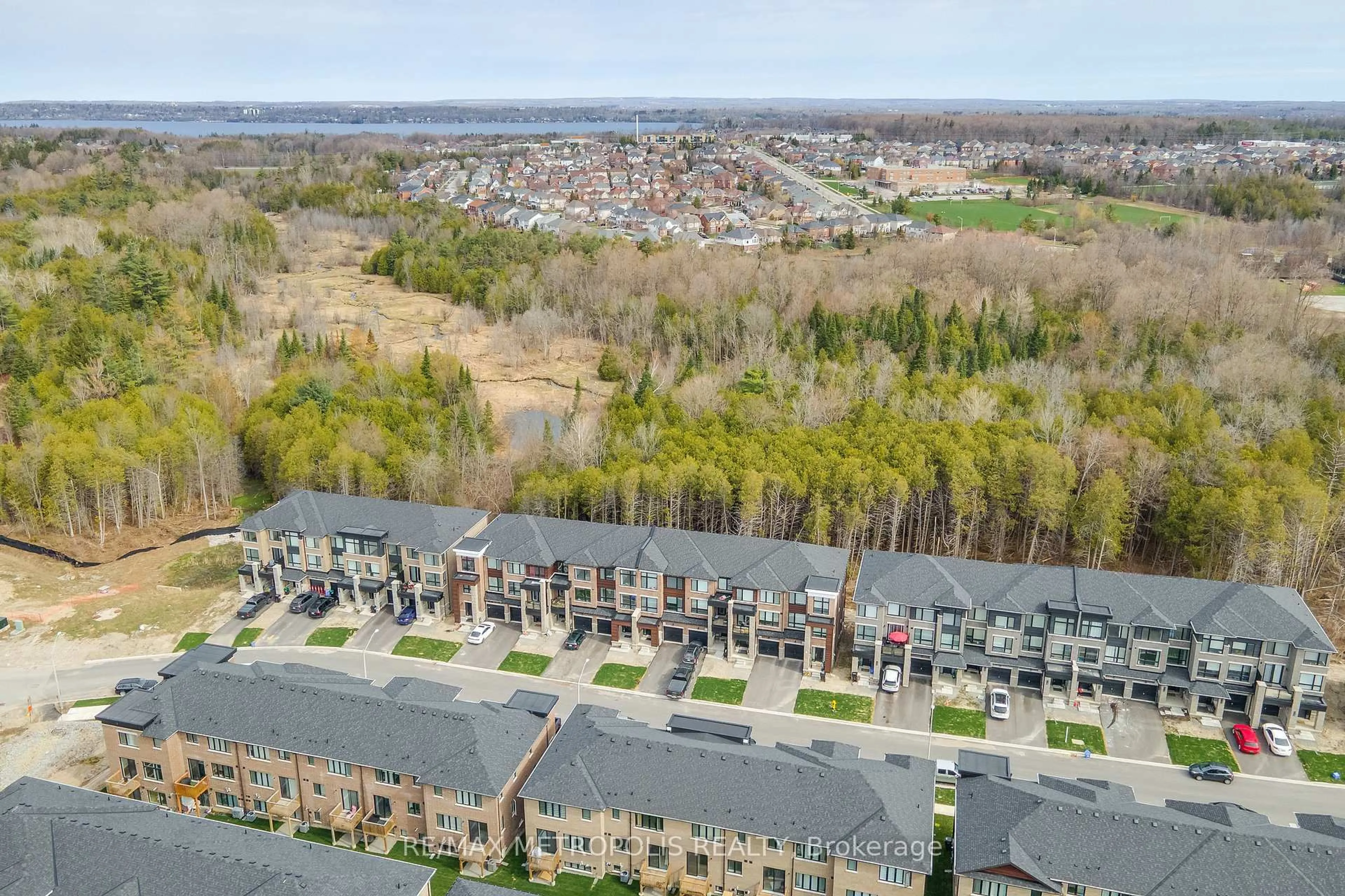 A pic from outside/outdoor area/front of a property/back of a property/a pic from drone, unknown for 132 Blue Forest Cres, Barrie Ontario L4M 7J6
