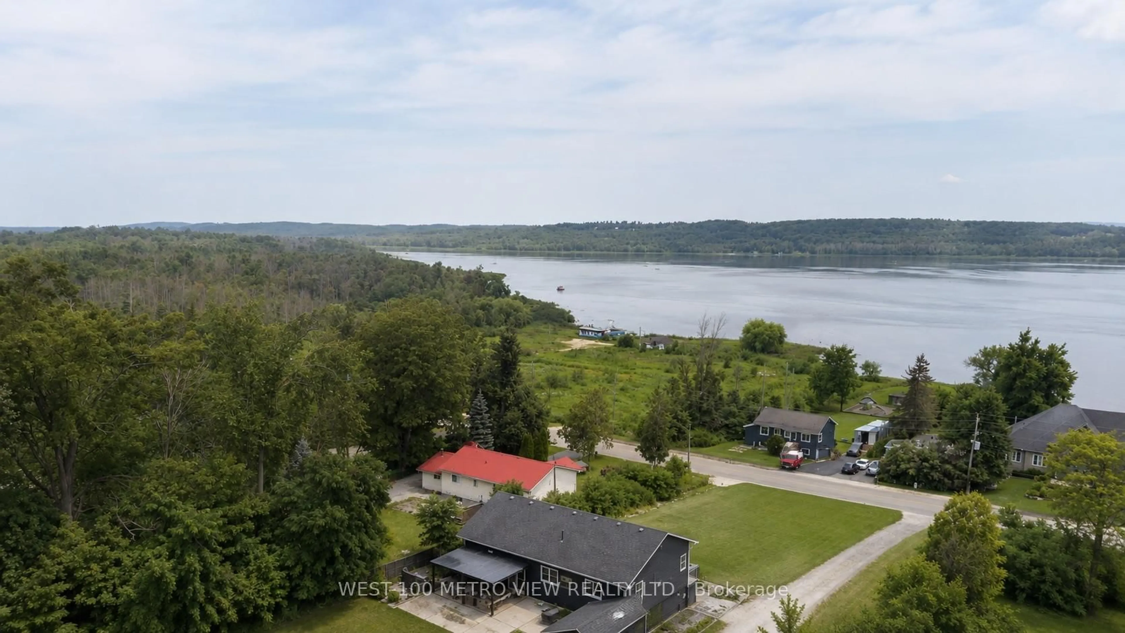 A pic from outside/outdoor area/front of a property/back of a property/a pic from drone, water/lake/river/ocean view for 56 Lakeside Terr #704, Barrie Ontario L4M 7B9