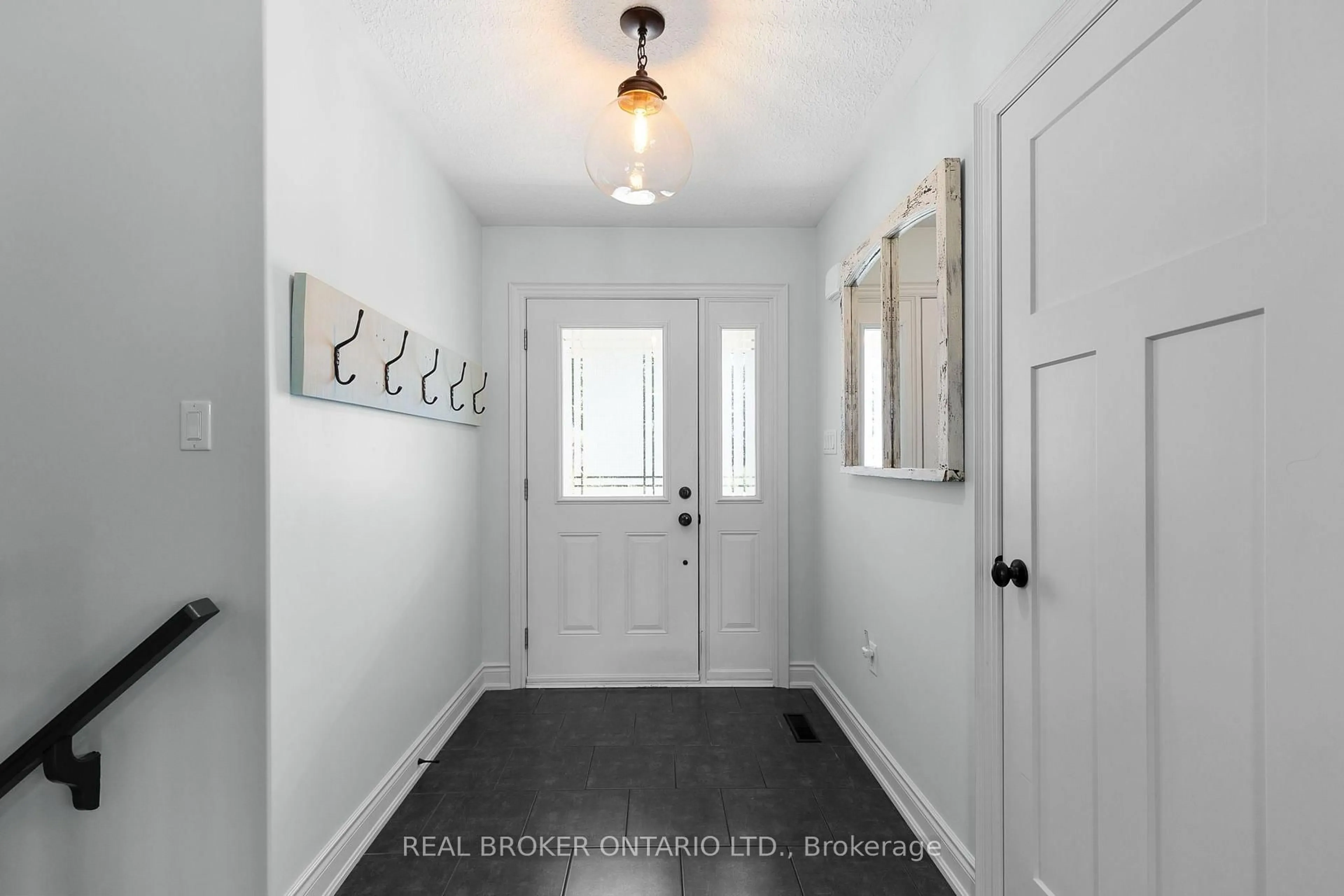 Indoor entryway for 34 Merrington Ave, Oro-Medonte Ontario L3V 0R5