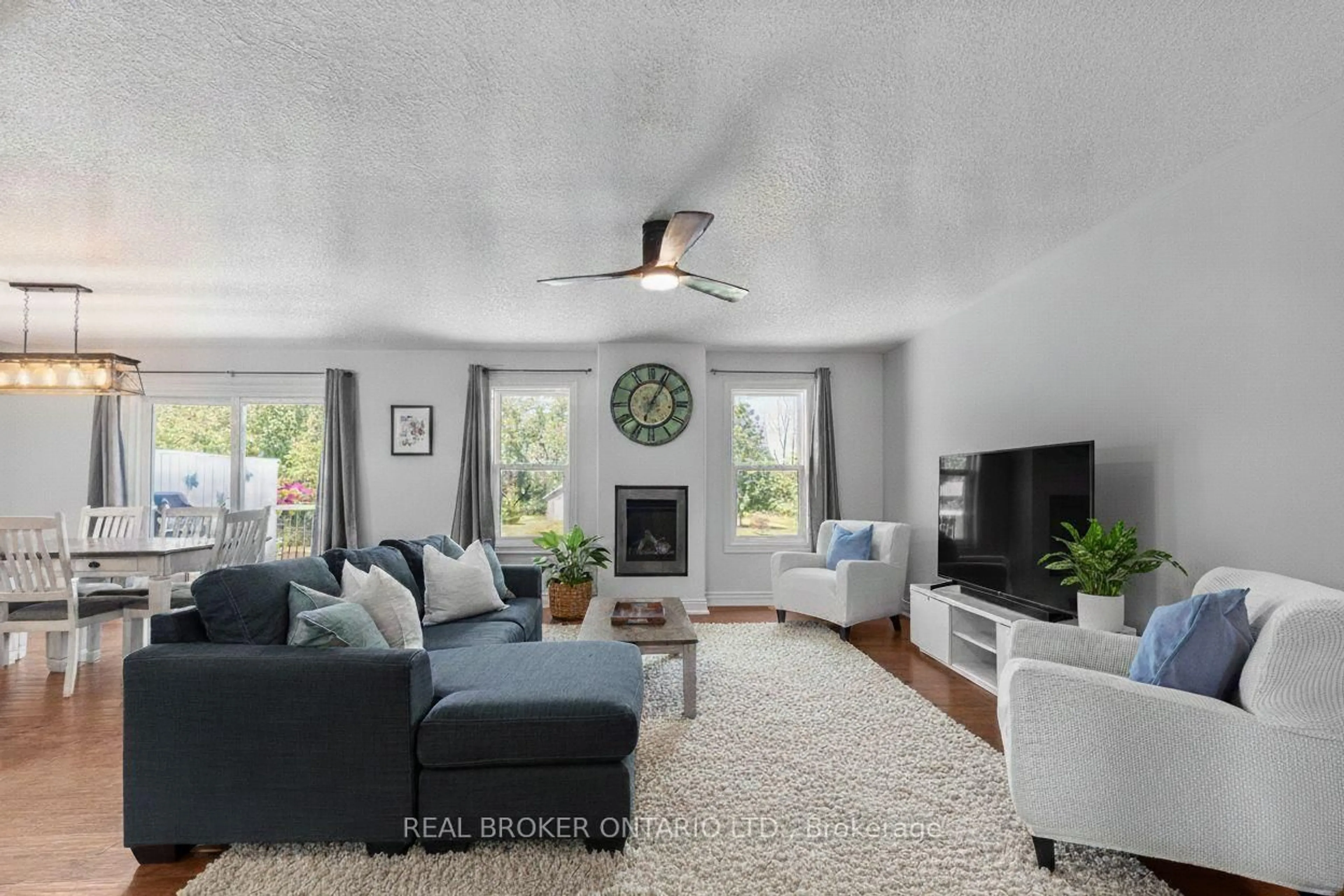 Living room with furniture, unknown for 34 Merrington Ave, Oro-Medonte Ontario L3V 0R5