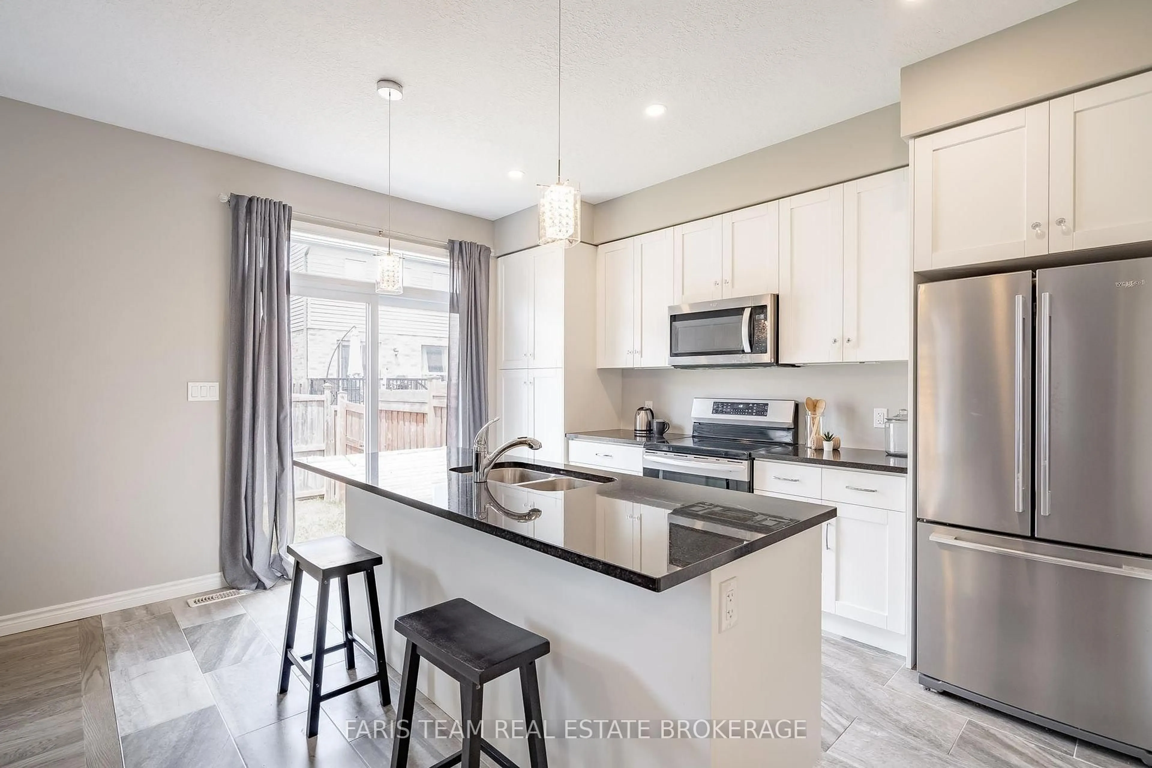 Open concept kitchen, ceramic/tile floor for 1016 Wright Dr, Midland Ontario L4R 0E4