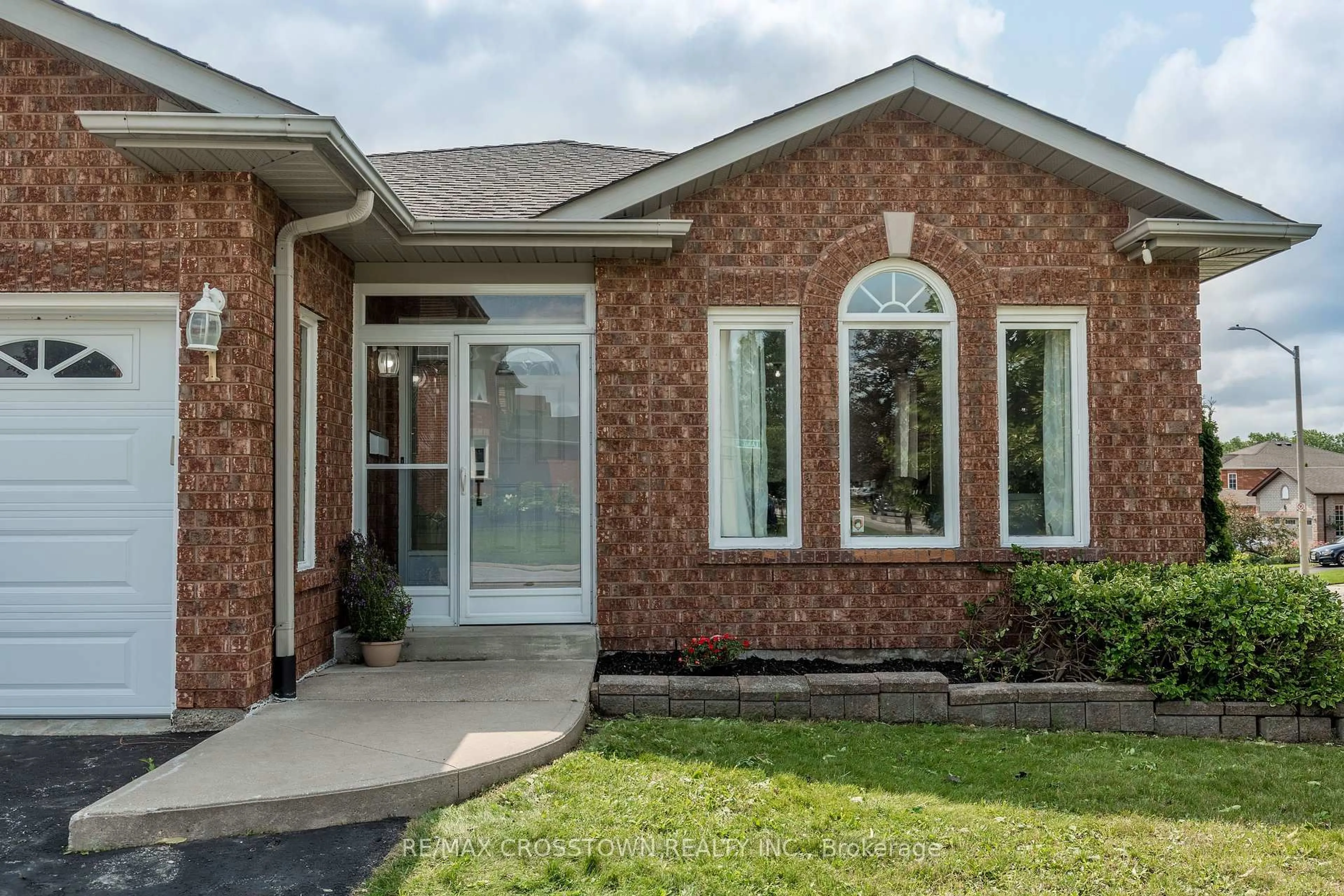 Home with brick exterior material, street for 1 Lang Dr, Barrie Ontario L4N 7X9