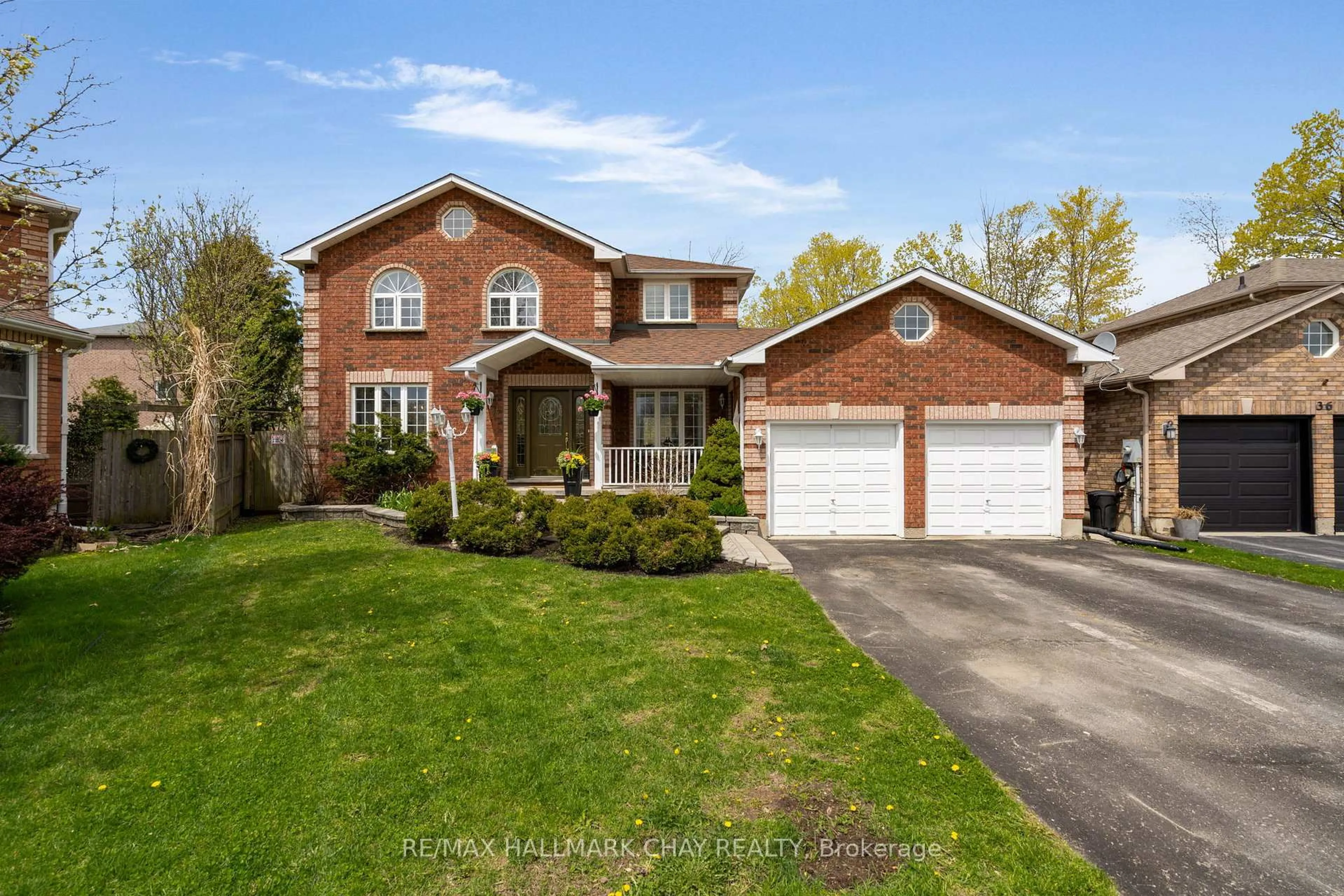 Home with brick exterior material, street for 34 Crompton Dr, Barrie Ontario L4M 6N1