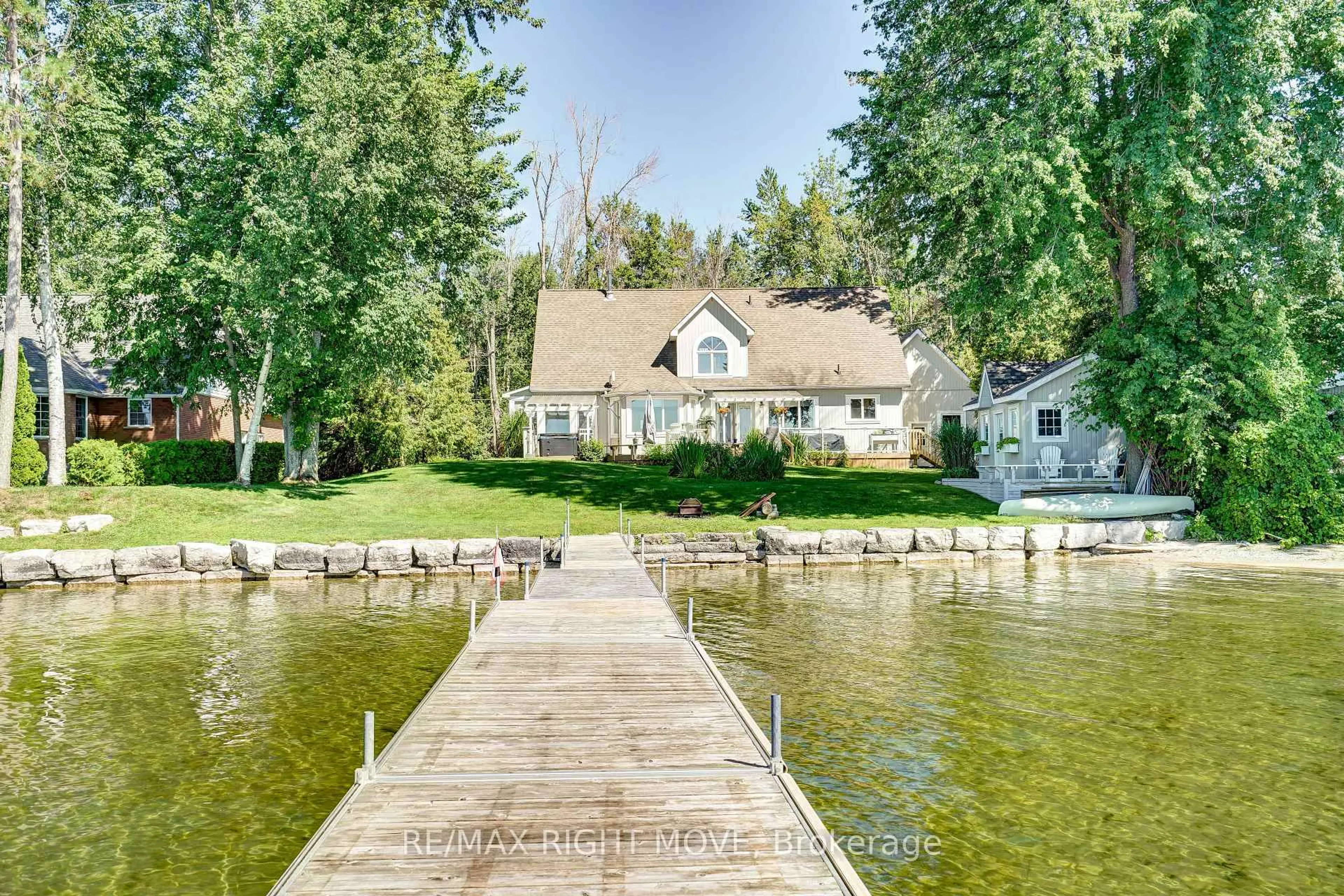 A pic from outside/outdoor area/front of a property/back of a property/a pic from drone, water/lake/river/ocean view for 3852 Muley Point Rd, Ramara Ontario L3V 6H7