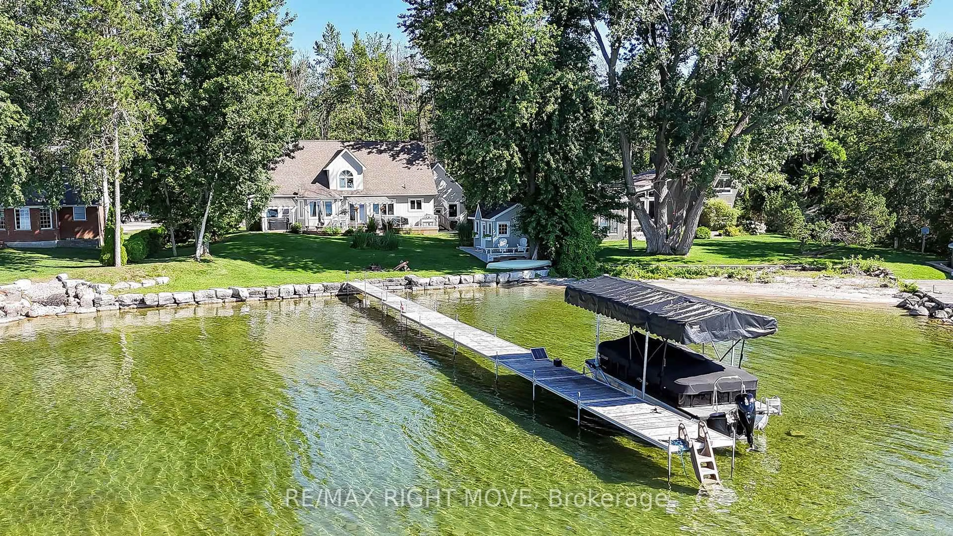 A pic from outside/outdoor area/front of a property/back of a property/a pic from drone, water/lake/river/ocean view for 3852 Muley Point Rd, Ramara Ontario L3V 6H7