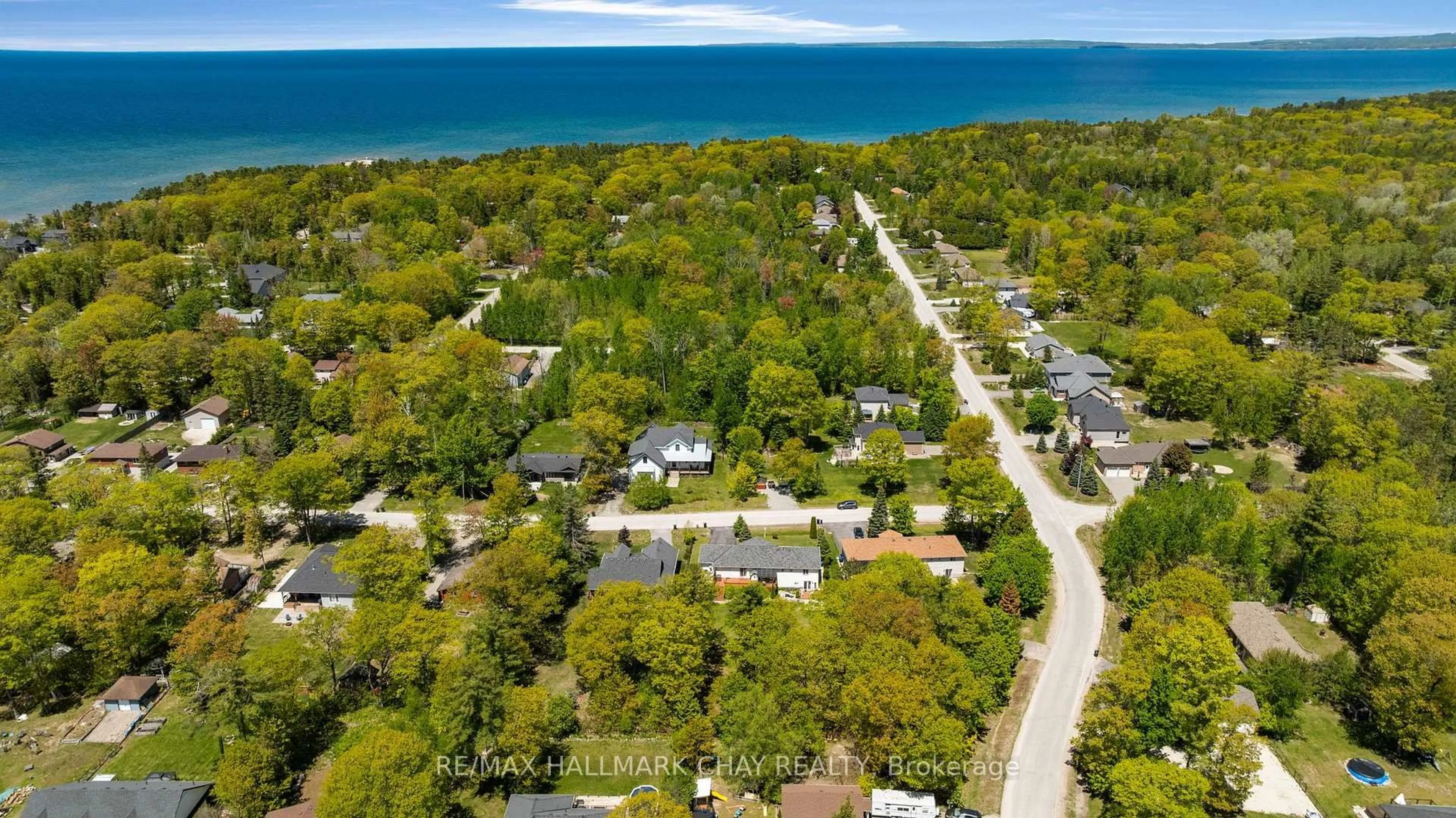 A pic from outside/outdoor area/front of a property/back of a property/a pic from drone, water/lake/river/ocean view for 29 Foliage Dr, Tiny Ontario L0L 1P1