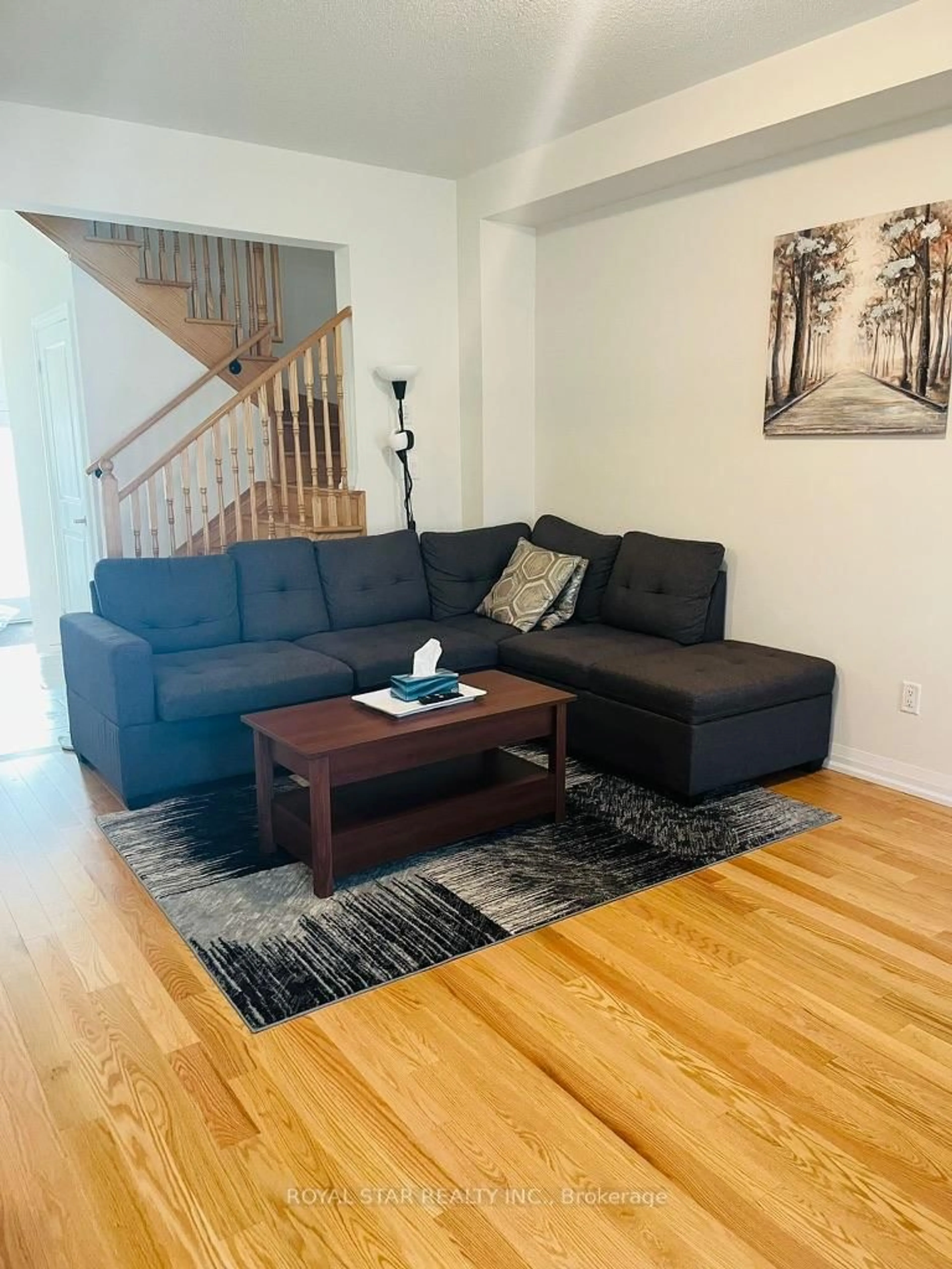 Living room with furniture, wood/laminate floor for 7 Federica Cres, Wasaga Beach Ontario L9Z 0N5