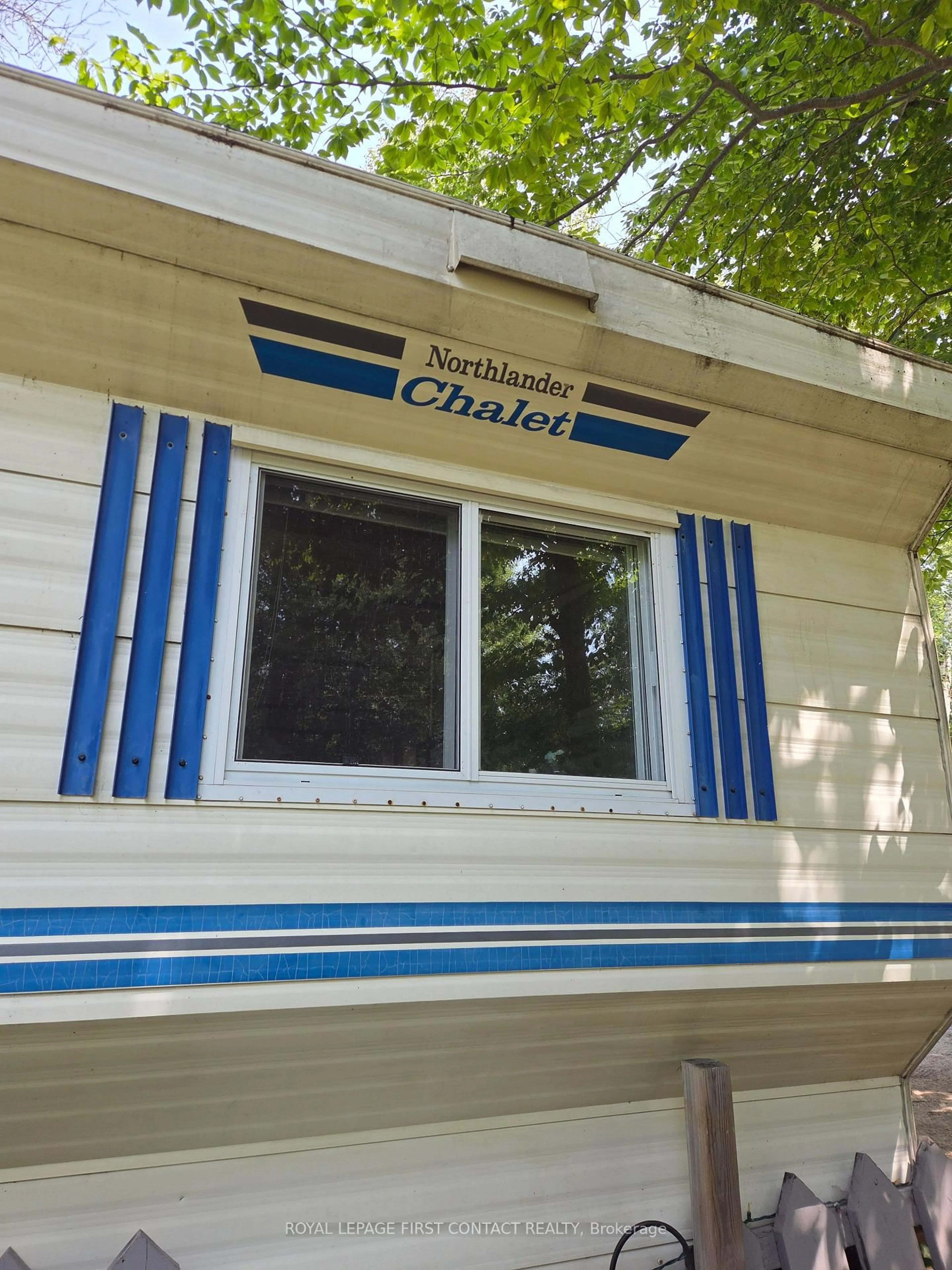 Home with vinyl exterior material, street for 2894 Hogback Rd #Site# 409, Clearview Ontario L0M 1N0