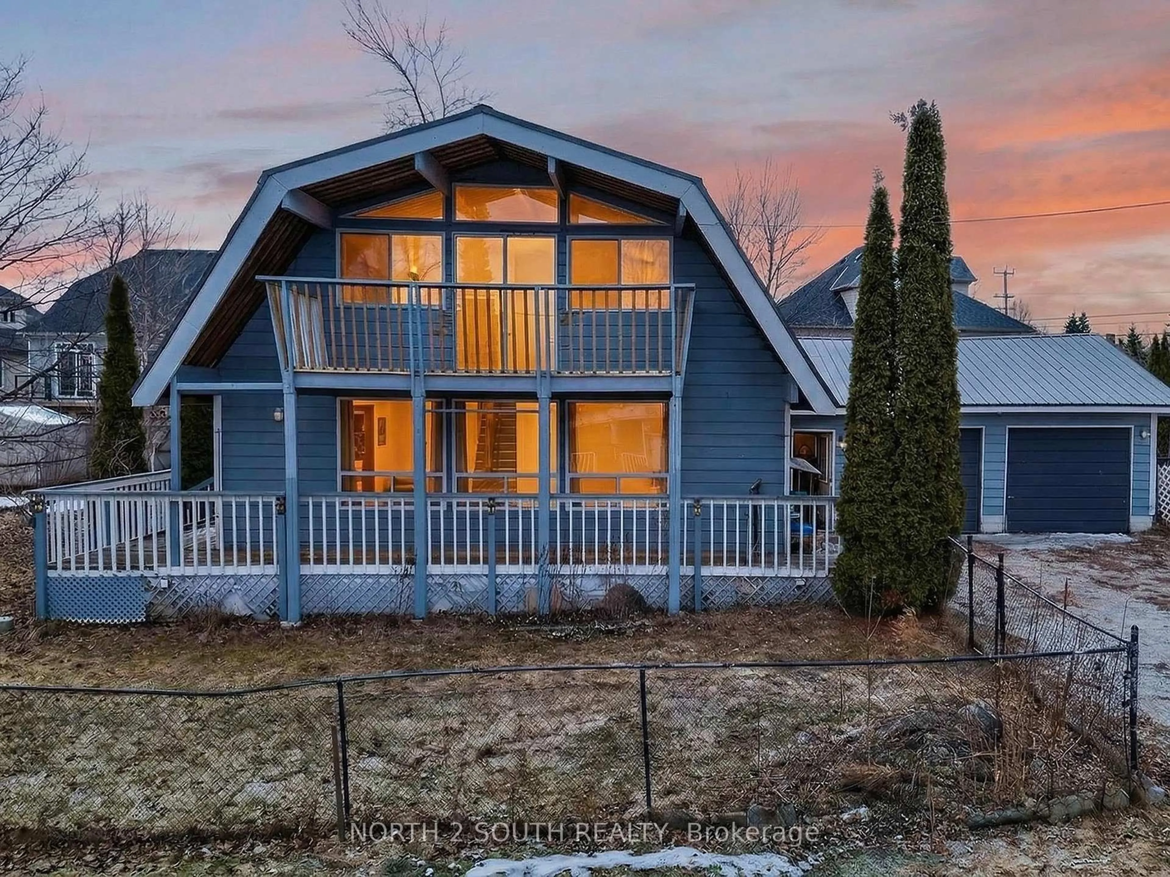A pic from outside/outdoor area/front of a property/back of a property/a pic from drone, mountain view for 13 Bayview Ave, Wasaga Beach Ontario L9Z 2Y6