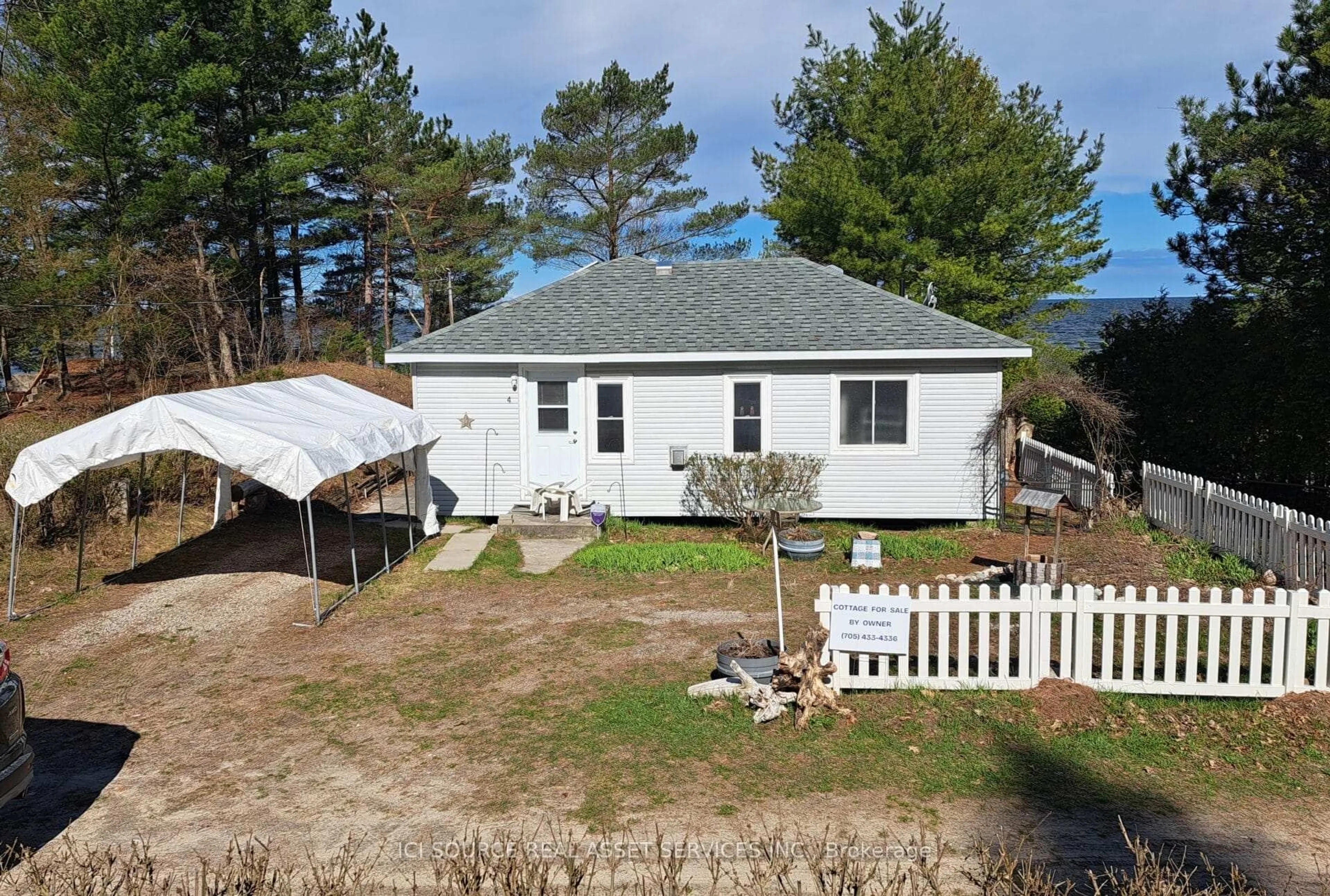 A pic from outside/outdoor area/front of a property/back of a property/a pic from drone, water/lake/river/ocean view for 4 Pinewood Dr, Tiny Ontario L0L 2T0