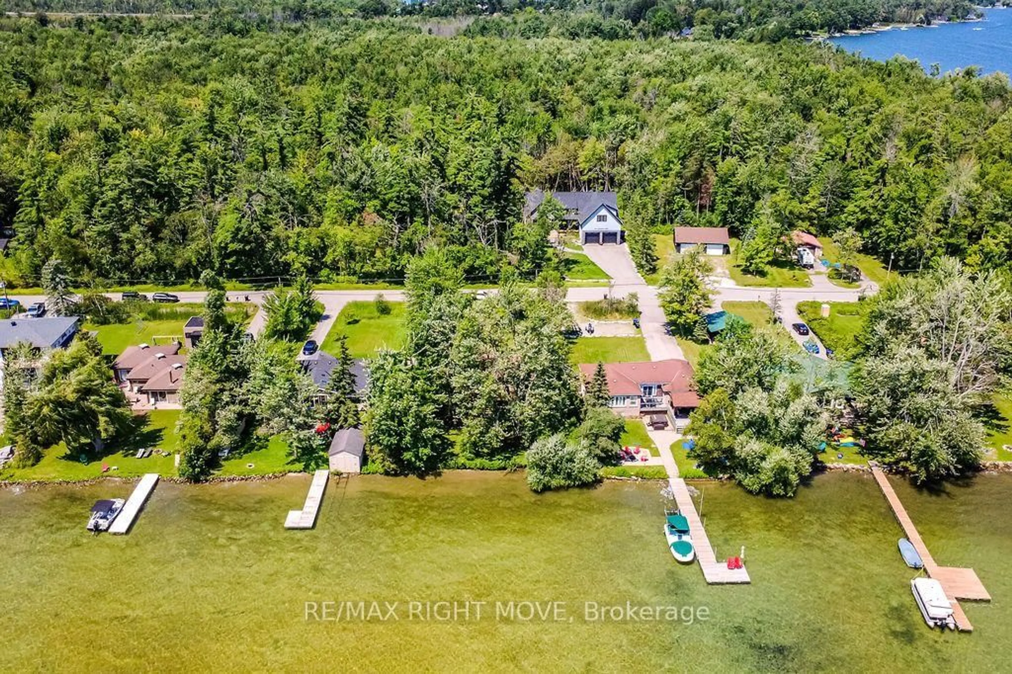 A pic from outside/outdoor area/front of a property/back of a property/a pic from drone, water/lake/river/ocean view for 1525 Cunningham Cres, Severn Ontario L3V 7E1