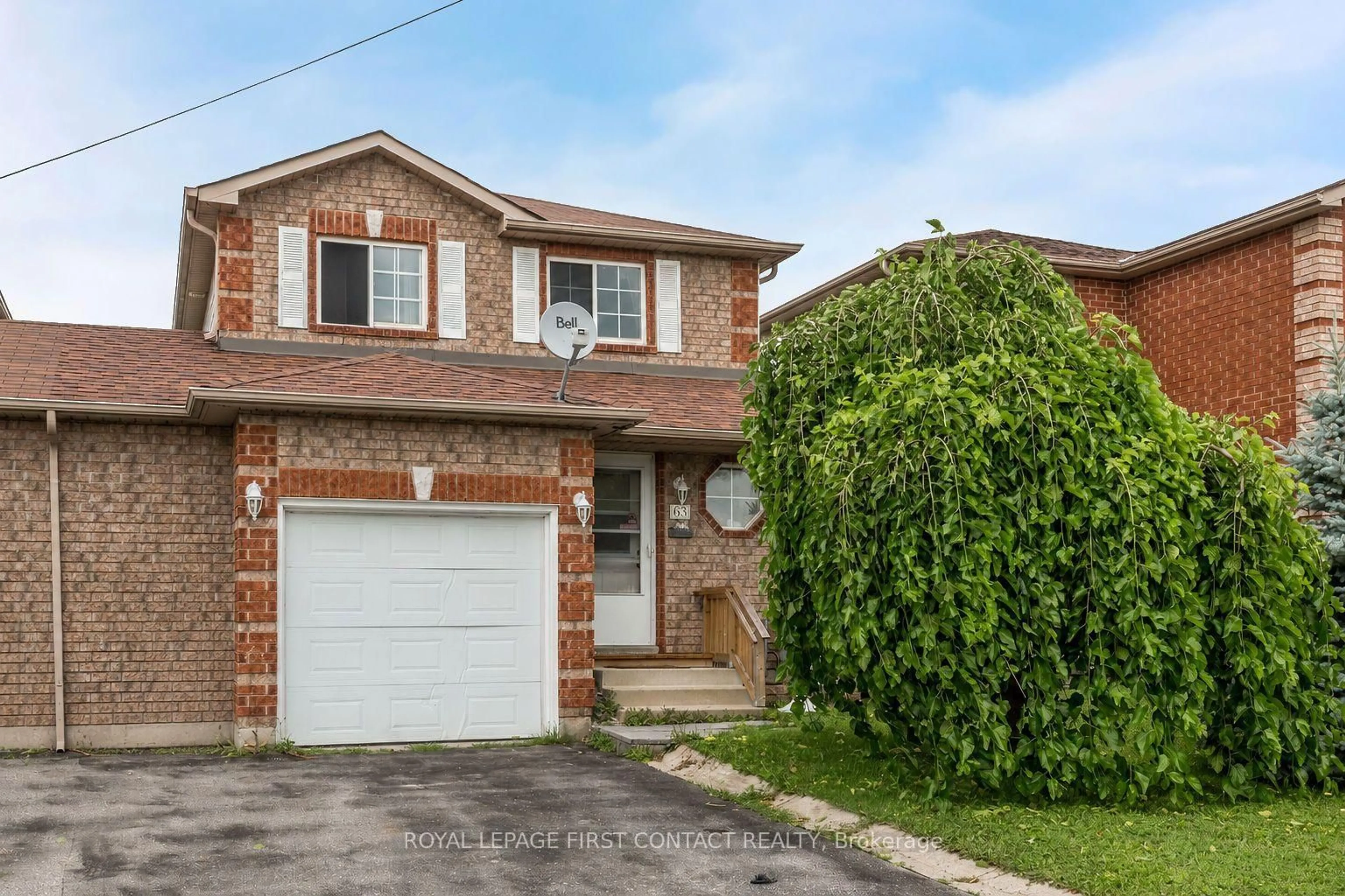 Home with brick exterior material, street for 63 Dunsmore Lane, Barrie Ontario L4M 6Z9