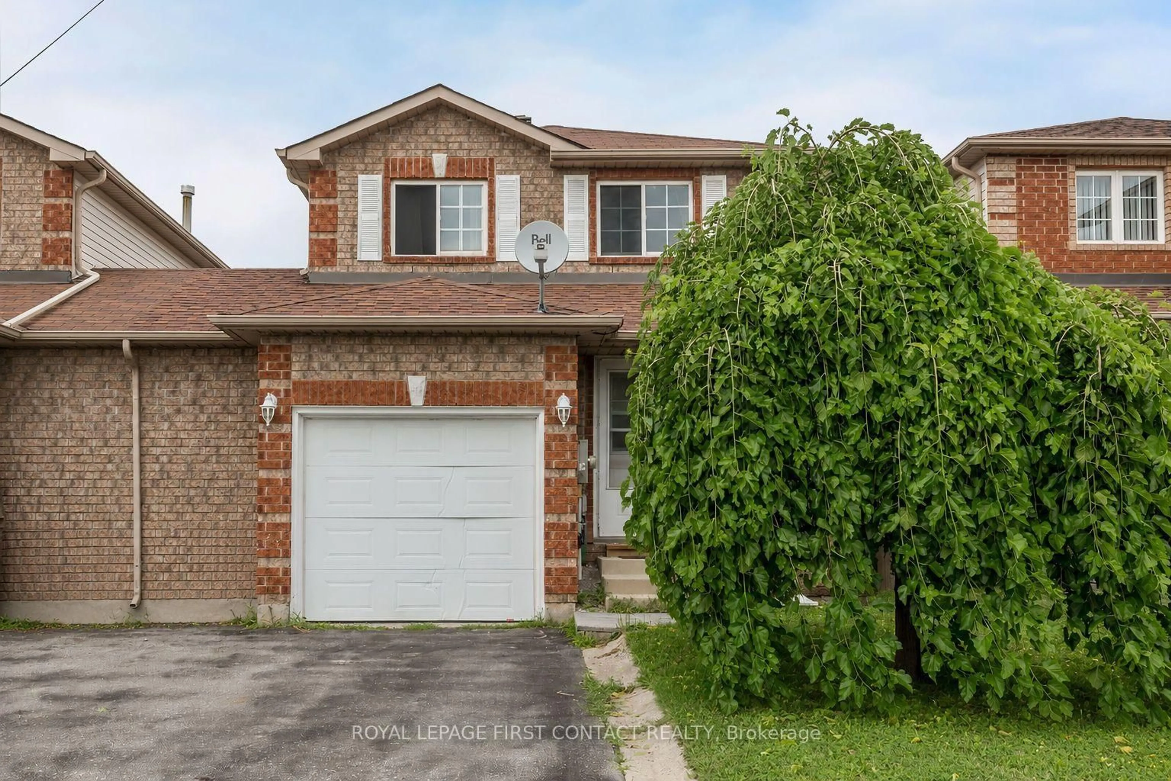 Home with brick exterior material, street for 63 Dunsmore Lane, Barrie Ontario L4M 6Z9