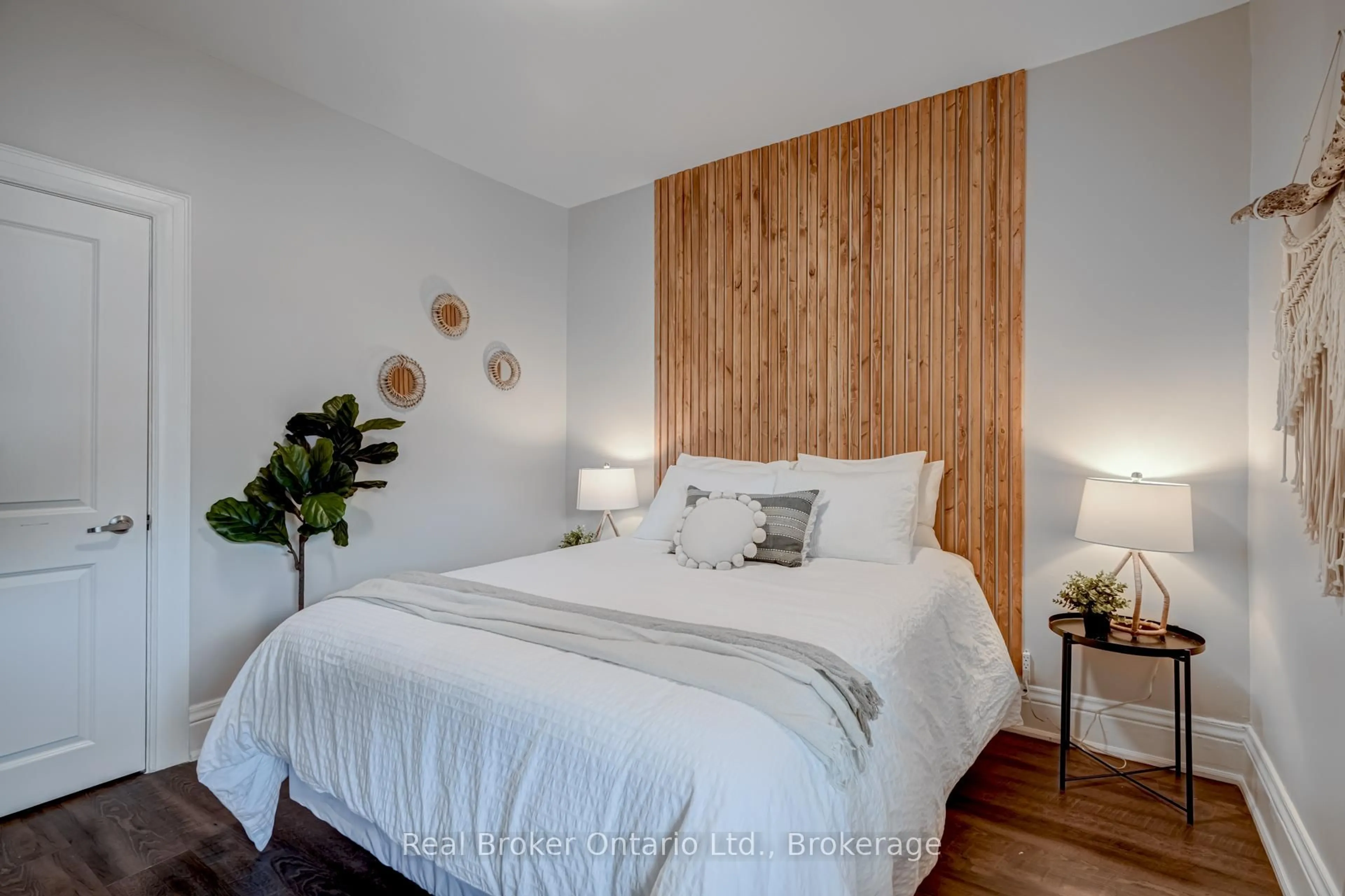 Bedroom with bed, wood/laminate floor for 66 Nottawasaga St, Orillia Ontario L3V 3J4