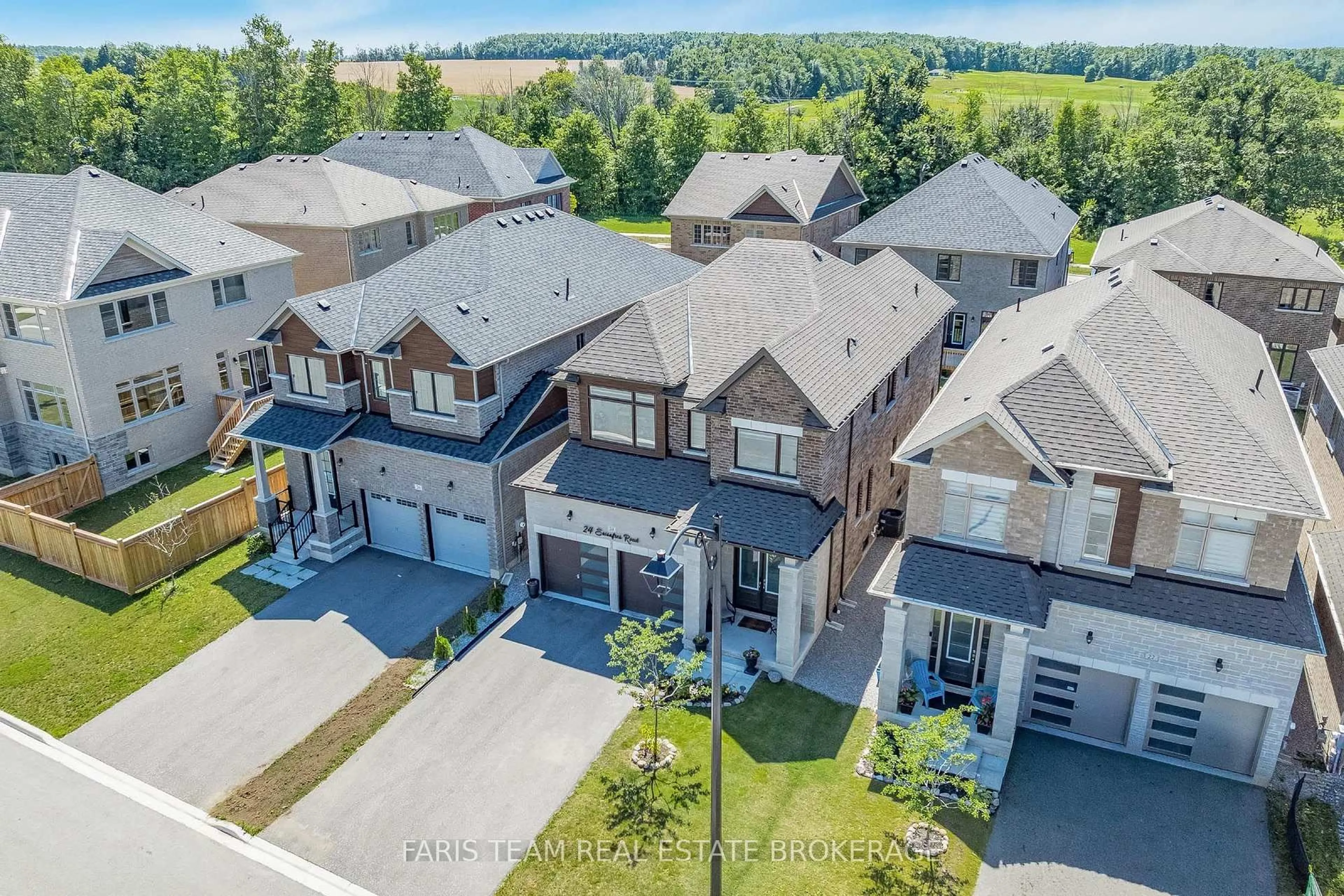 A pic from outside/outdoor area/front of a property/back of a property/a pic from drone, unknown for 24 Sassafras Rd, Springwater Ontario L9X 2C6