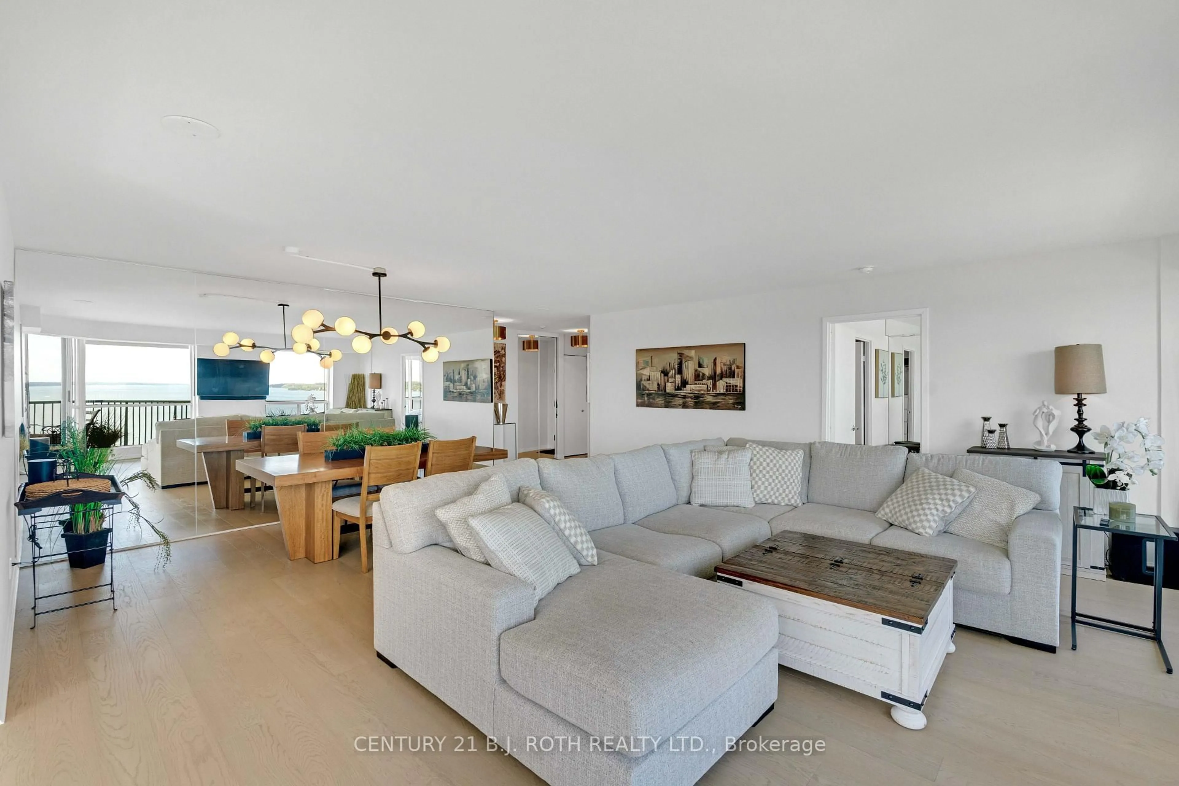Living room with furniture, unknown for 65 Ellen St #1104, Barrie Ontario L4N 3A5