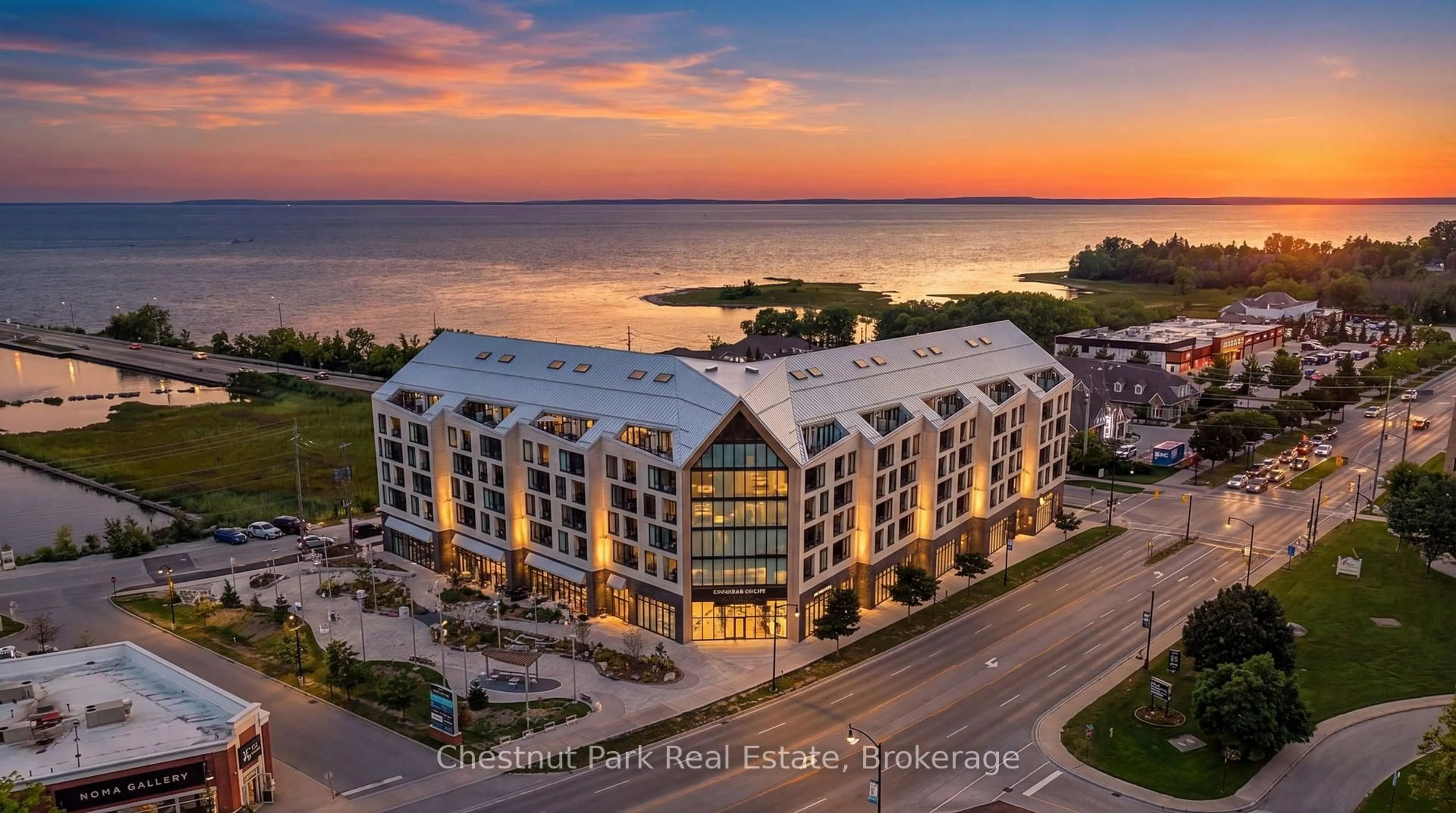 A pic from outside/outdoor area/front of a property/back of a property/a pic from drone, water/lake/river/ocean view for 31 Huron St #618, Collingwood Ontario L9Y 5T7