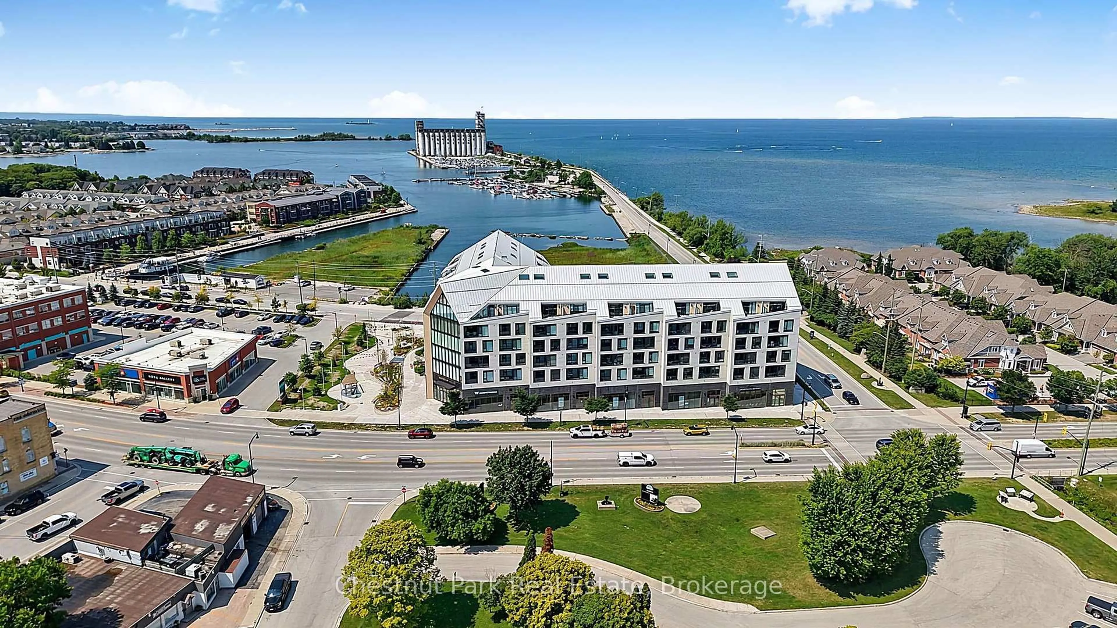 A pic from outside/outdoor area/front of a property/back of a property/a pic from drone, water/lake/river/ocean view for 31 Huron St #618, Collingwood Ontario L9Y 5T7