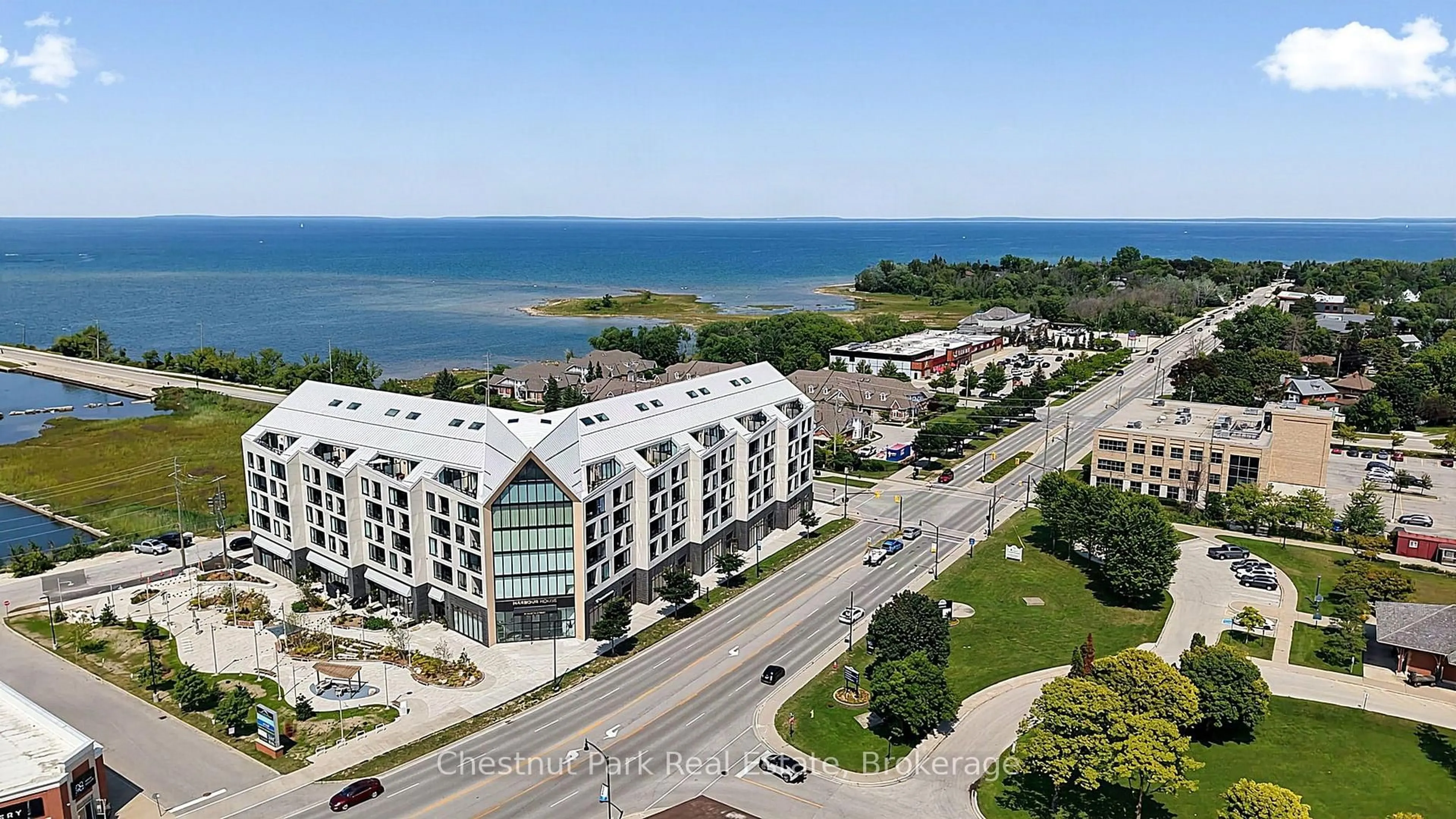 A pic from outside/outdoor area/front of a property/back of a property/a pic from drone, water/lake/river/ocean view for 31 Huron St #618, Collingwood Ontario L9Y 5T7