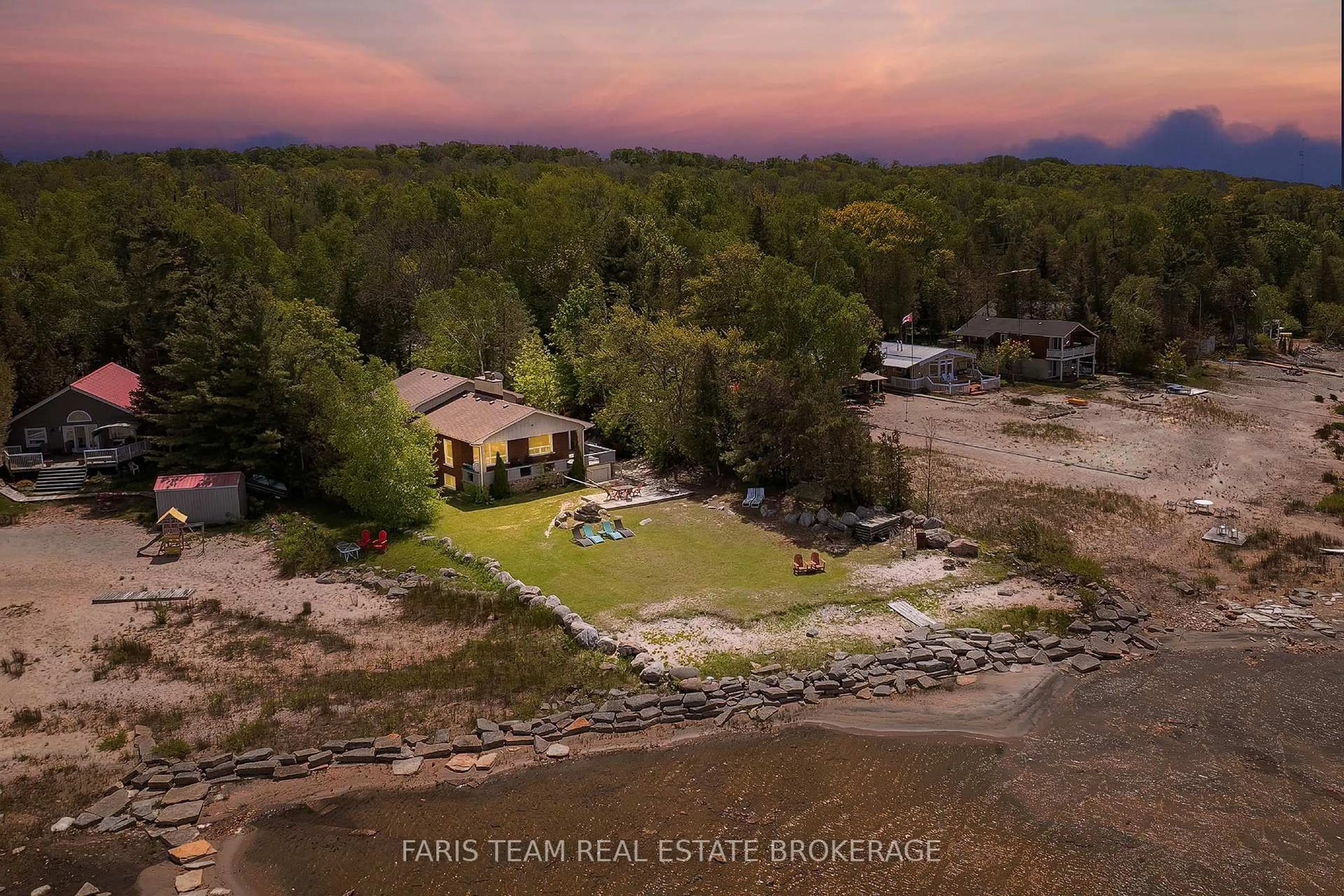 A pic from outside/outdoor area/front of a property/back of a property/a pic from drone, water/lake/river/ocean view for 1787 Champlain Rd, Tiny Ontario L9M 0B6