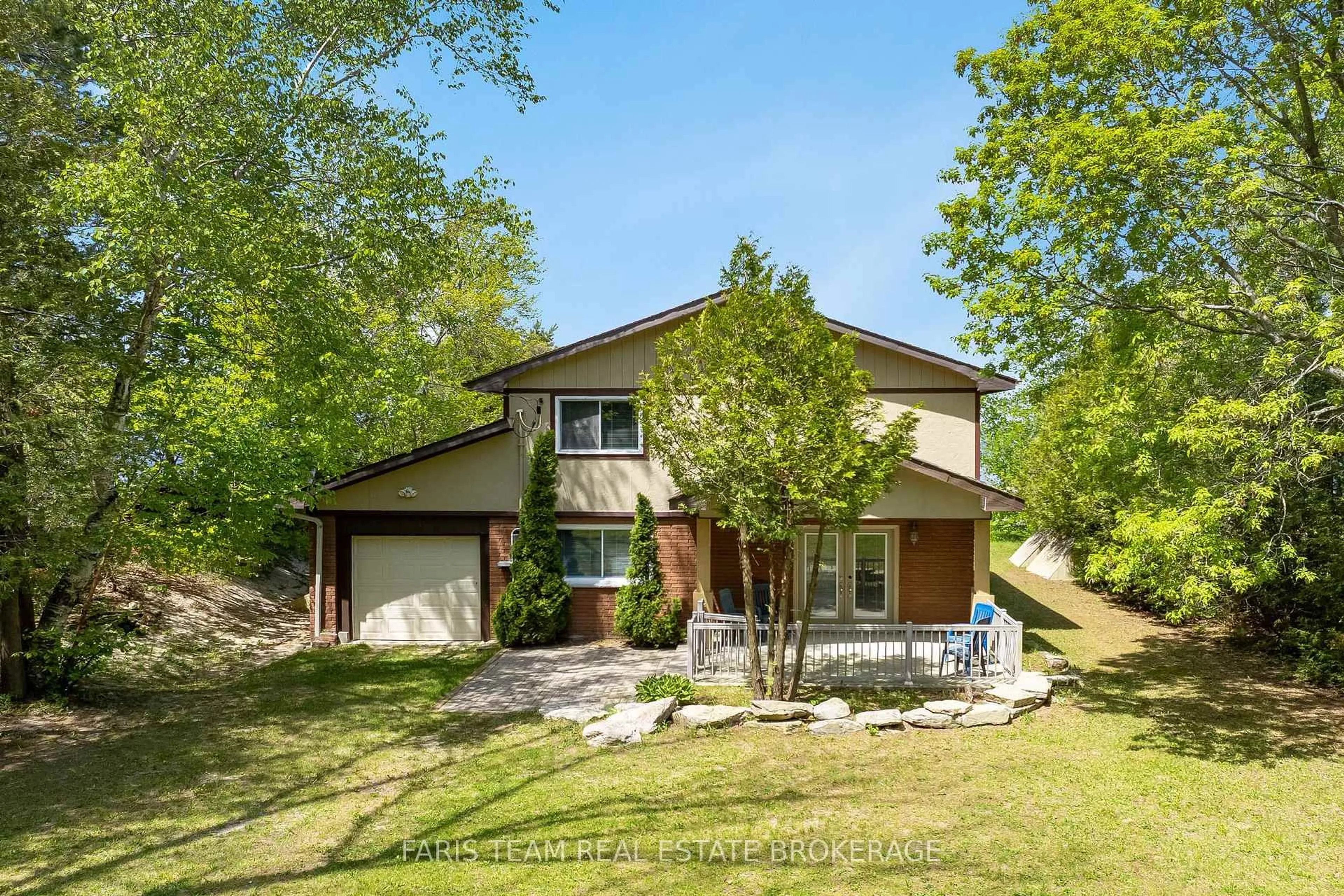 A pic from outside/outdoor area/front of a property/back of a property/a pic from drone, street for 1787 Champlain Rd, Tiny Ontario L9M 0B6