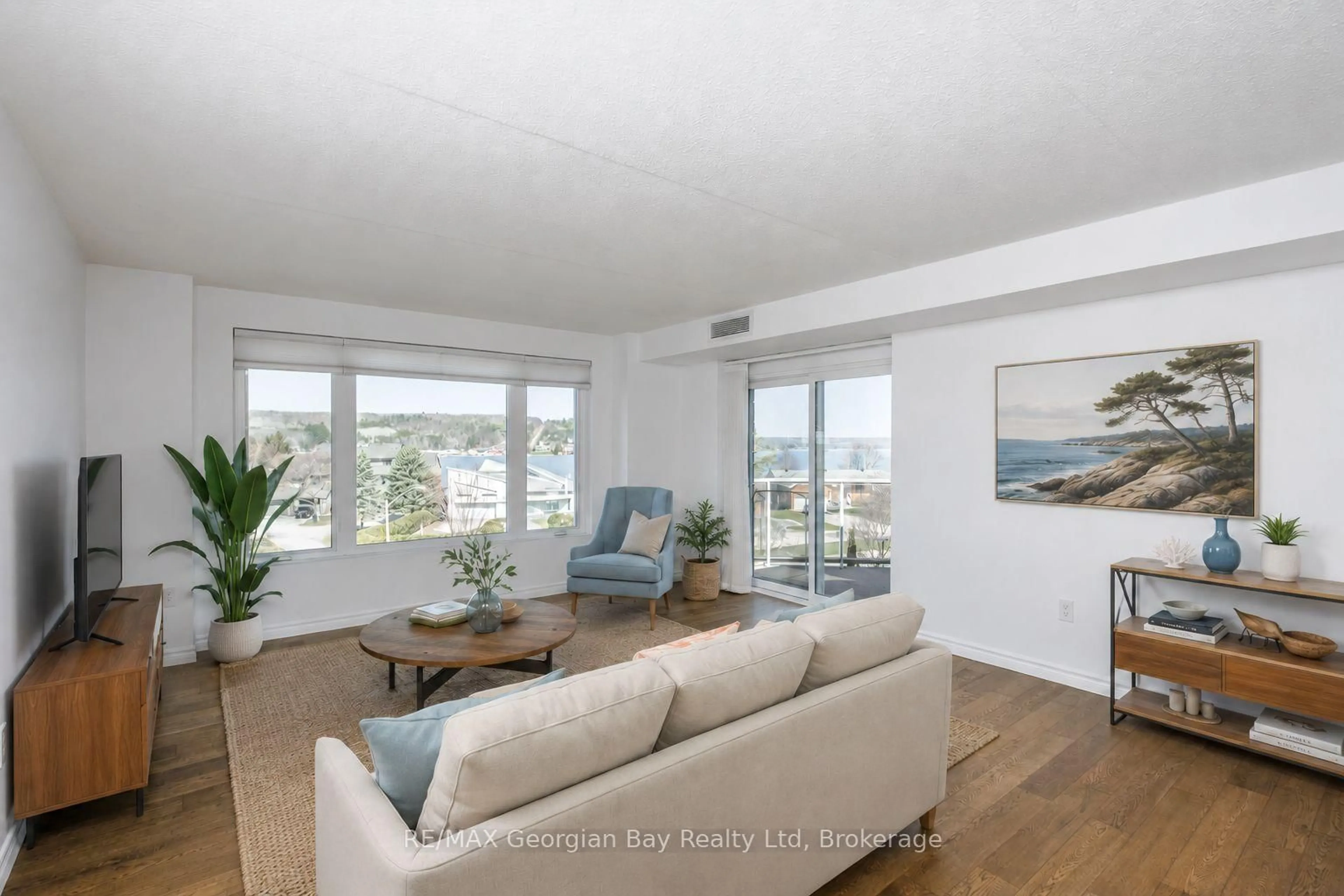 Living room with furniture, unknown for 11 Beck Blvd #404, Penetanguishene Ontario L9M 2G1
