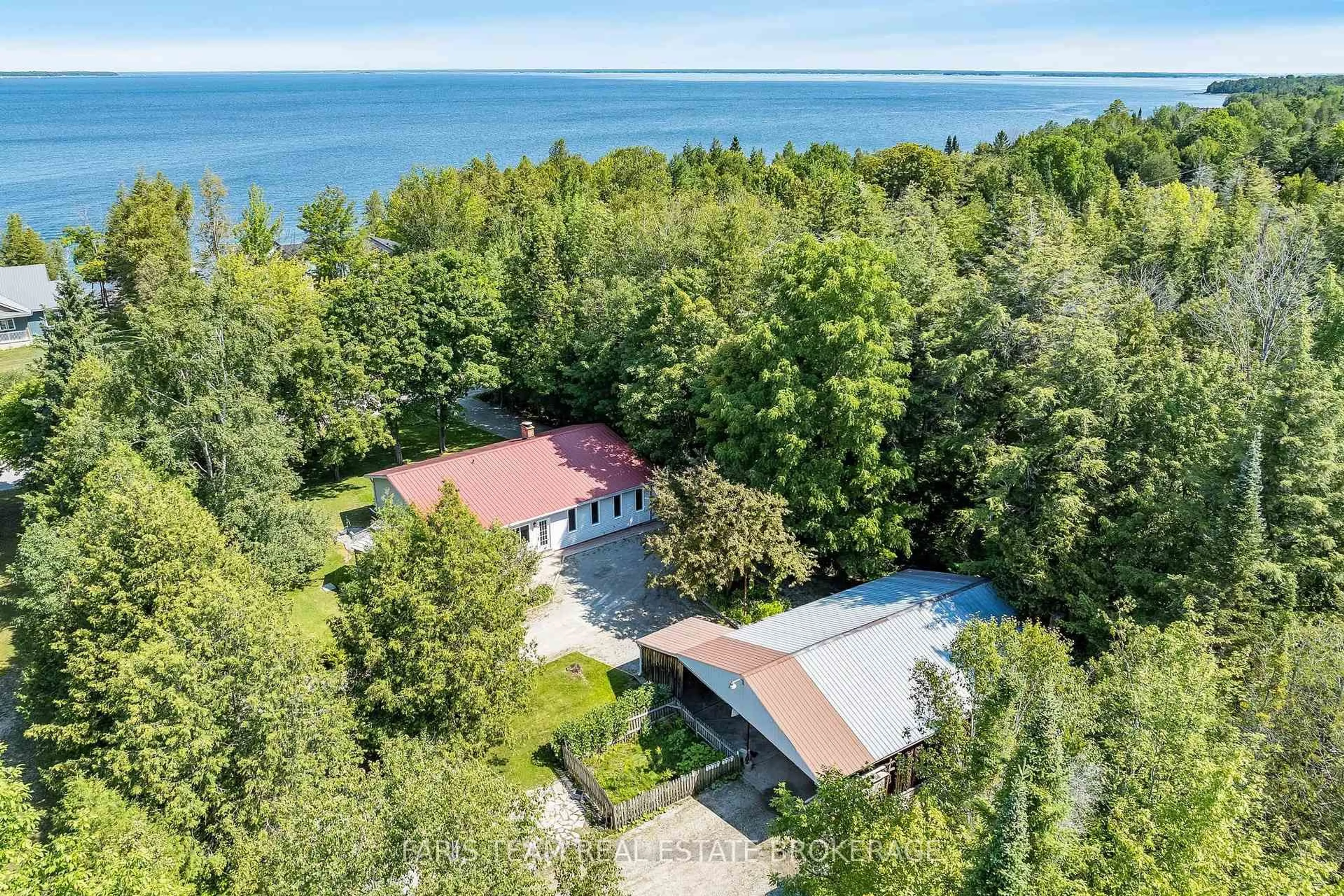 A pic from outside/outdoor area/front of a property/back of a property/a pic from drone, water/lake/river/ocean view for 2554 Champlain Rd, Tiny Ontario L9M 0C3