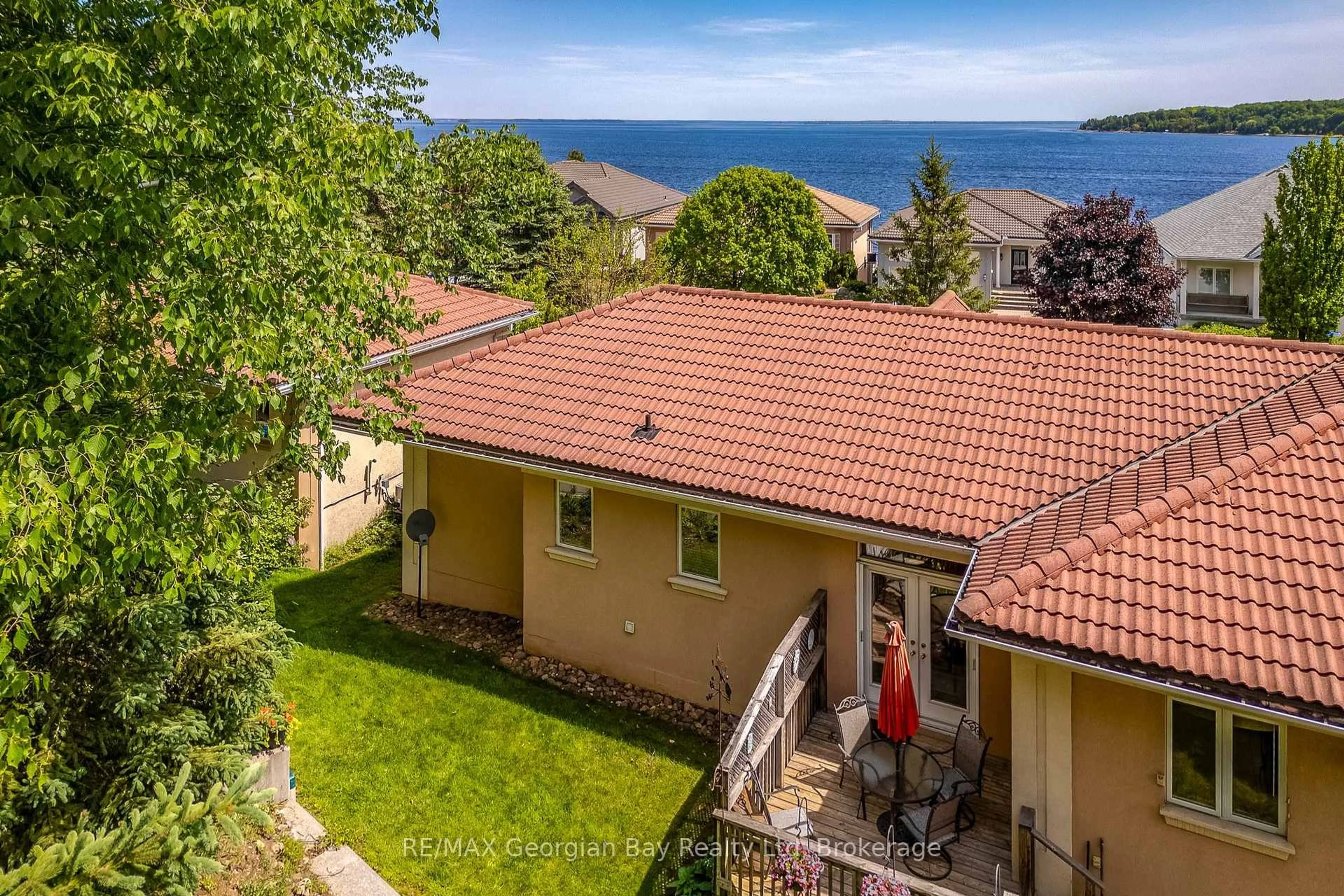 A pic from outside/outdoor area/front of a property/back of a property/a pic from drone, water/lake/river/ocean view for 494 Aberdeen Blvd, Midland Ontario L4R 5L9