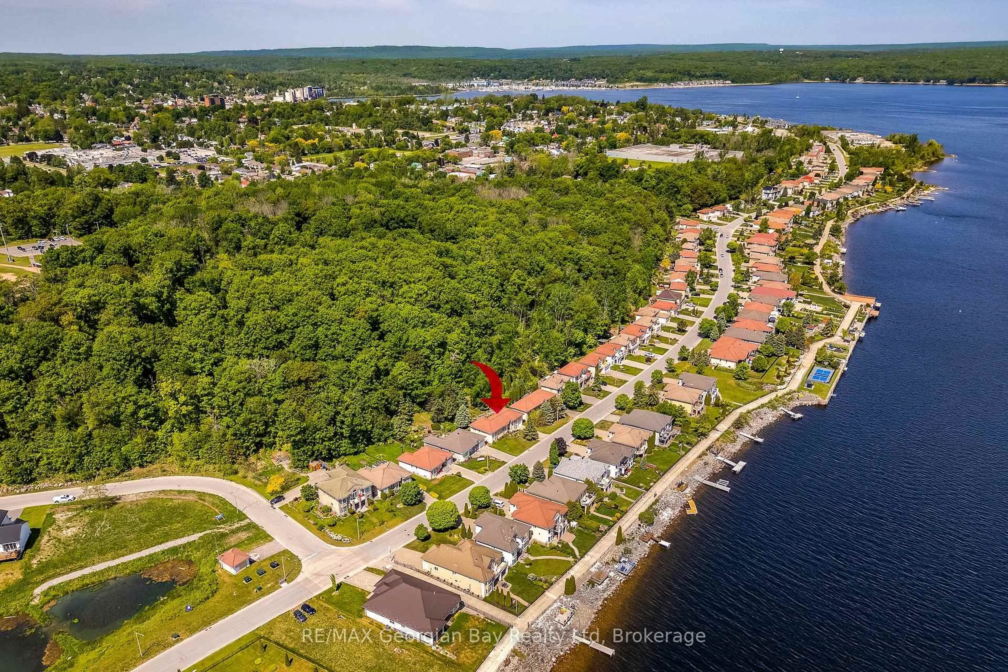 A pic from outside/outdoor area/front of a property/back of a property/a pic from drone, water/lake/river/ocean view for 494 Aberdeen Blvd, Midland Ontario L4R 5L9